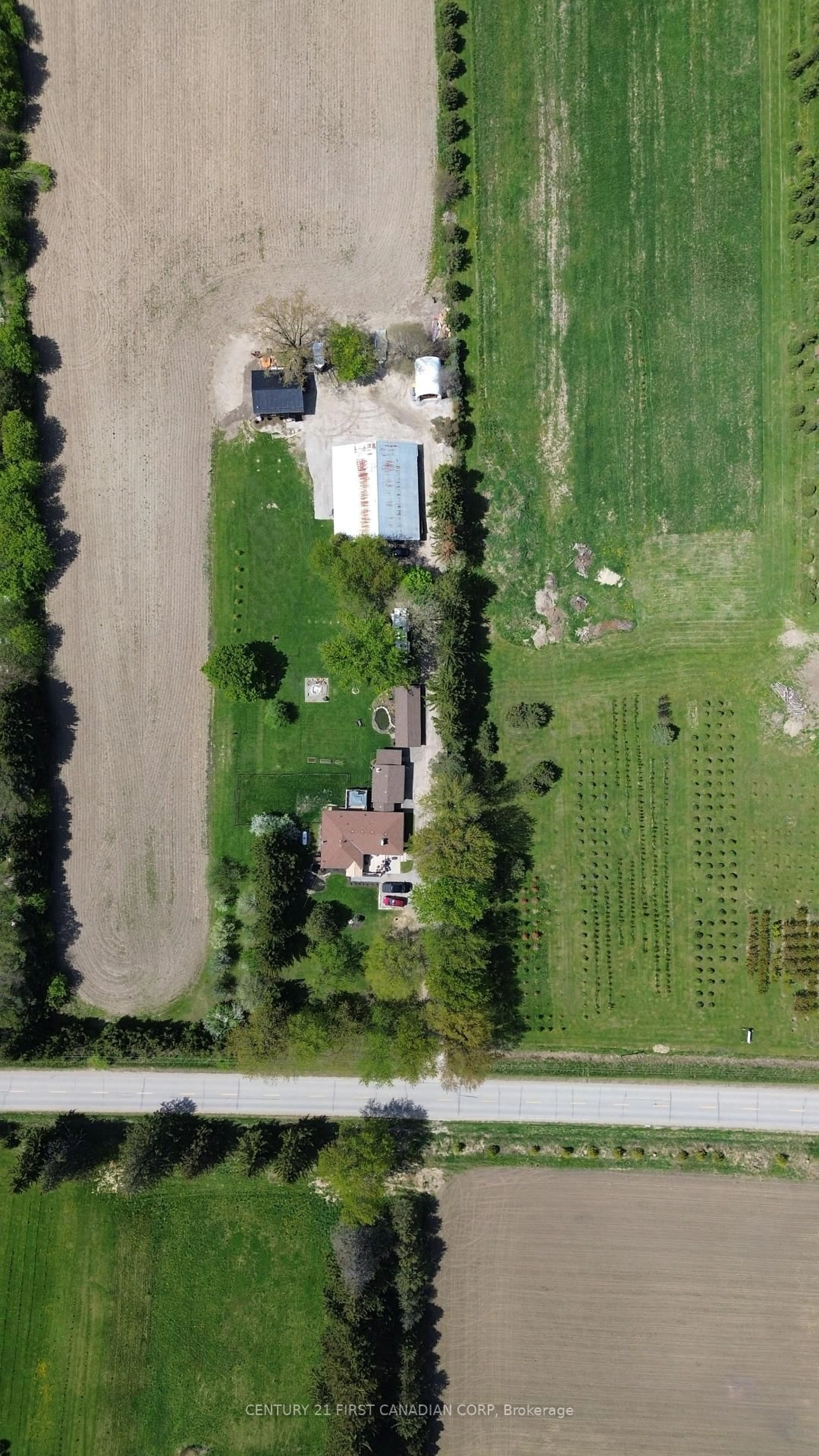 A pic from outside/outdoor area/front of a property/back of a property/a pic from drone, street for 20883 REBECCA Rd, Thames Centre Ontario N0E 1W0