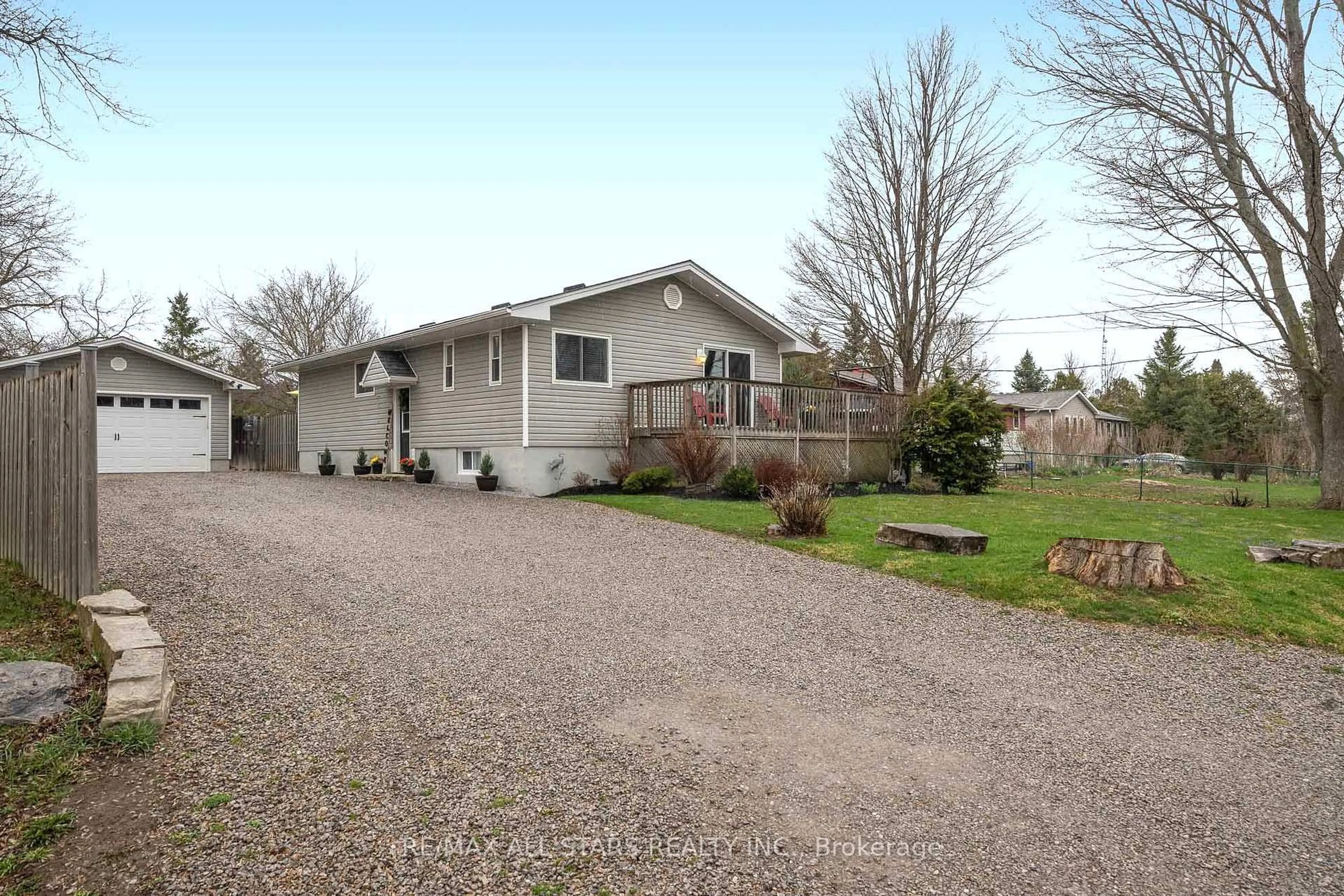 Home with vinyl exterior material, street for 32 Newman Rd, Kawartha Lakes Ontario K0M 2C0