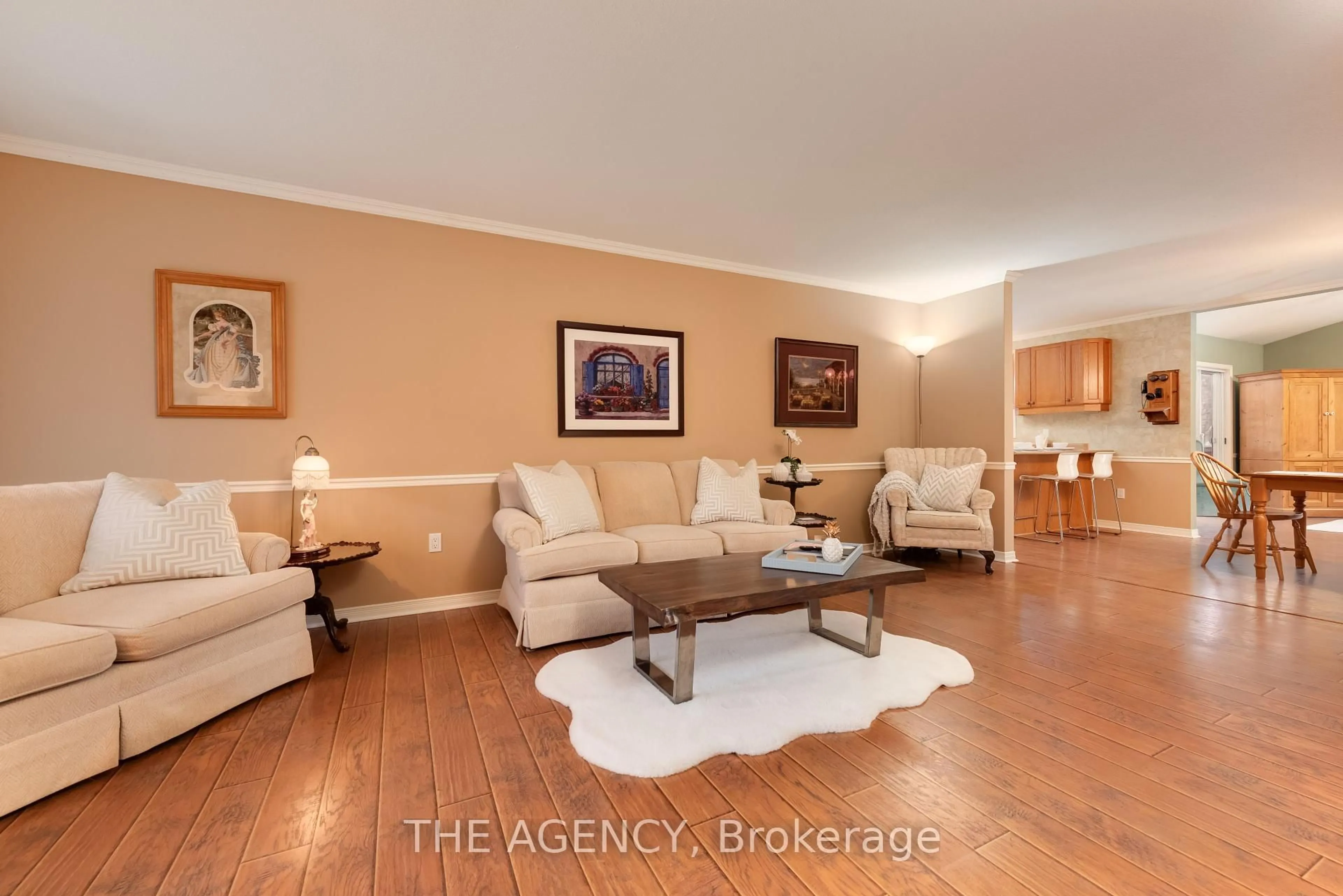 Living room with furniture, wood/laminate floor for 5 Springwood Cres, Gravenhurst Ontario P1P 1Z1
