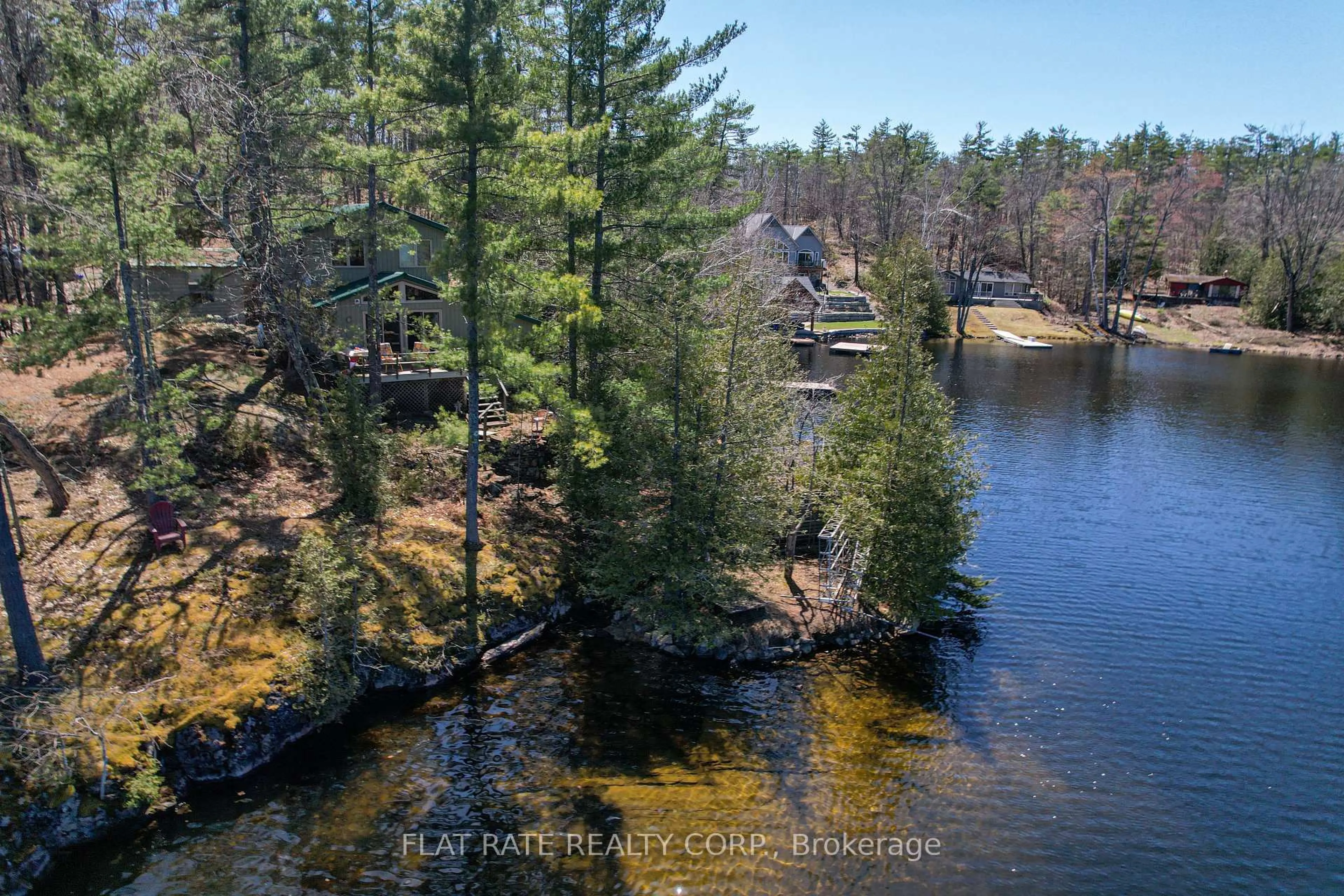 A pic from outside/outdoor area/front of a property/back of a property/a pic from drone, water/lake/river/ocean view for 2711 Channel View Lane, Smith-Ennismore-Lakefield Ontario K0L 2H0