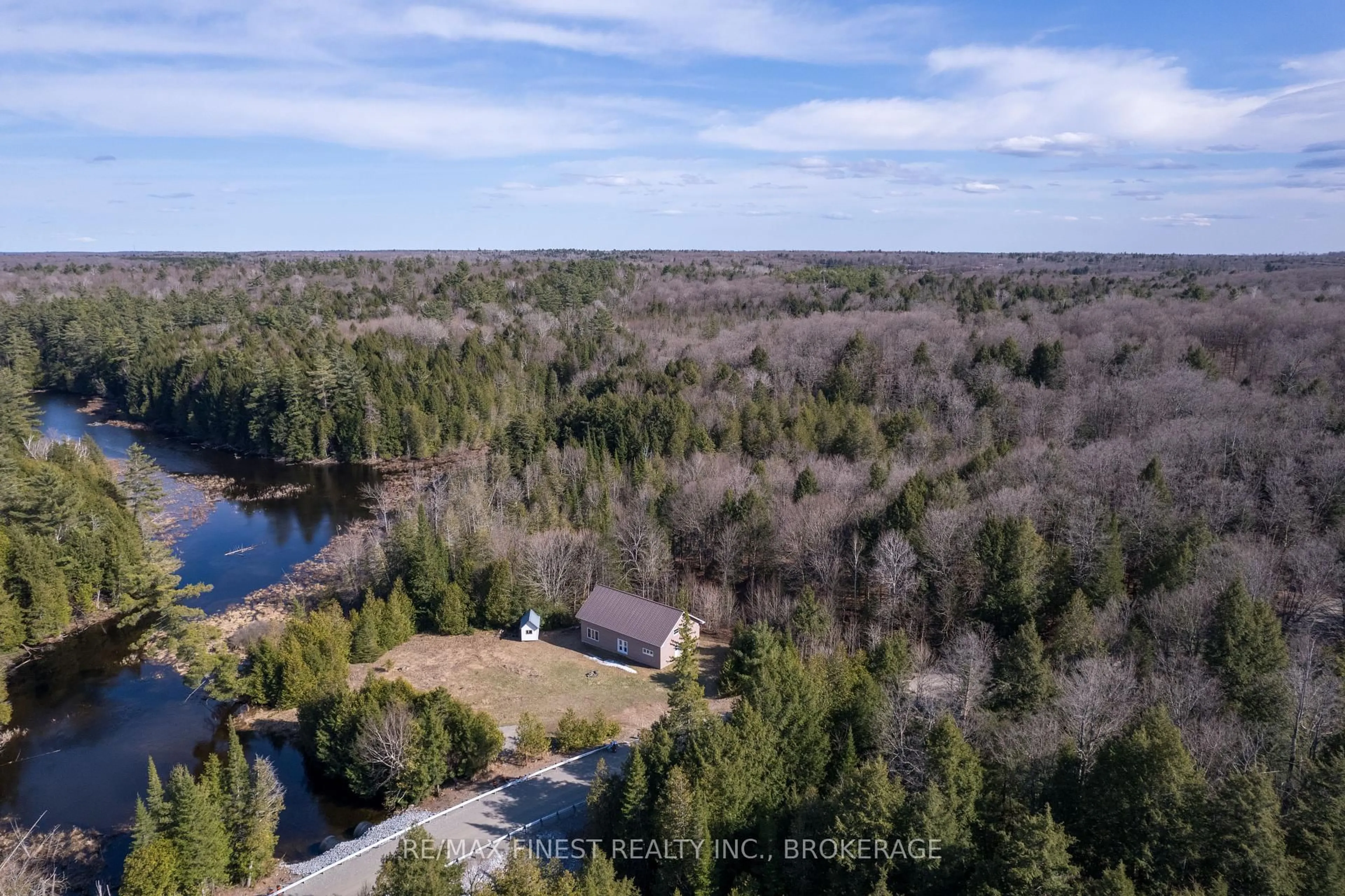 A pic from outside/outdoor area/front of a property/back of a property/a pic from drone, water/lake/river/ocean view for 1975 North Rd, Plevna Ontario K0H 2M0