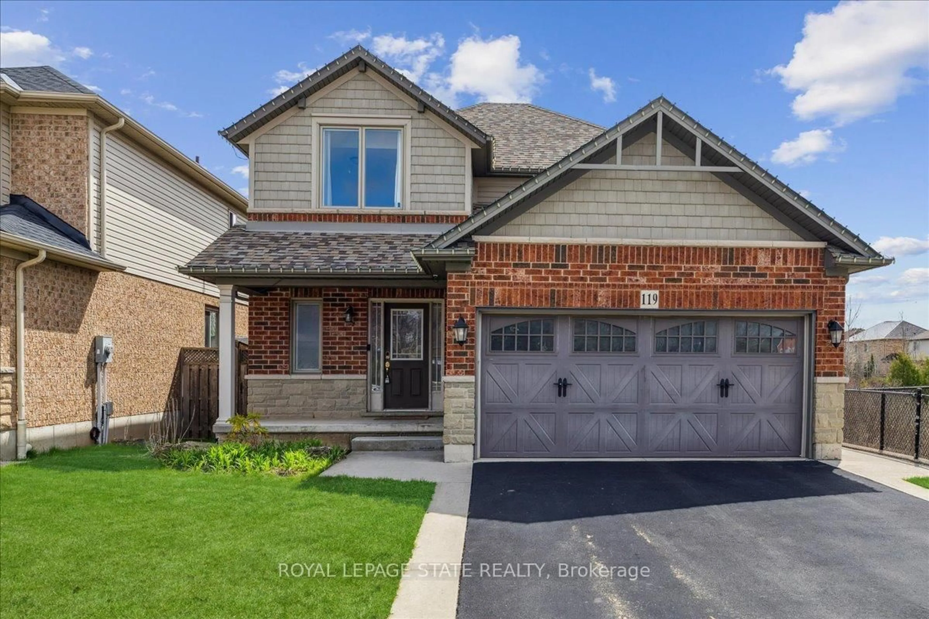 Home with brick exterior material, street for 119 Great Oak Tr, Hamilton Ontario L0R 1C0