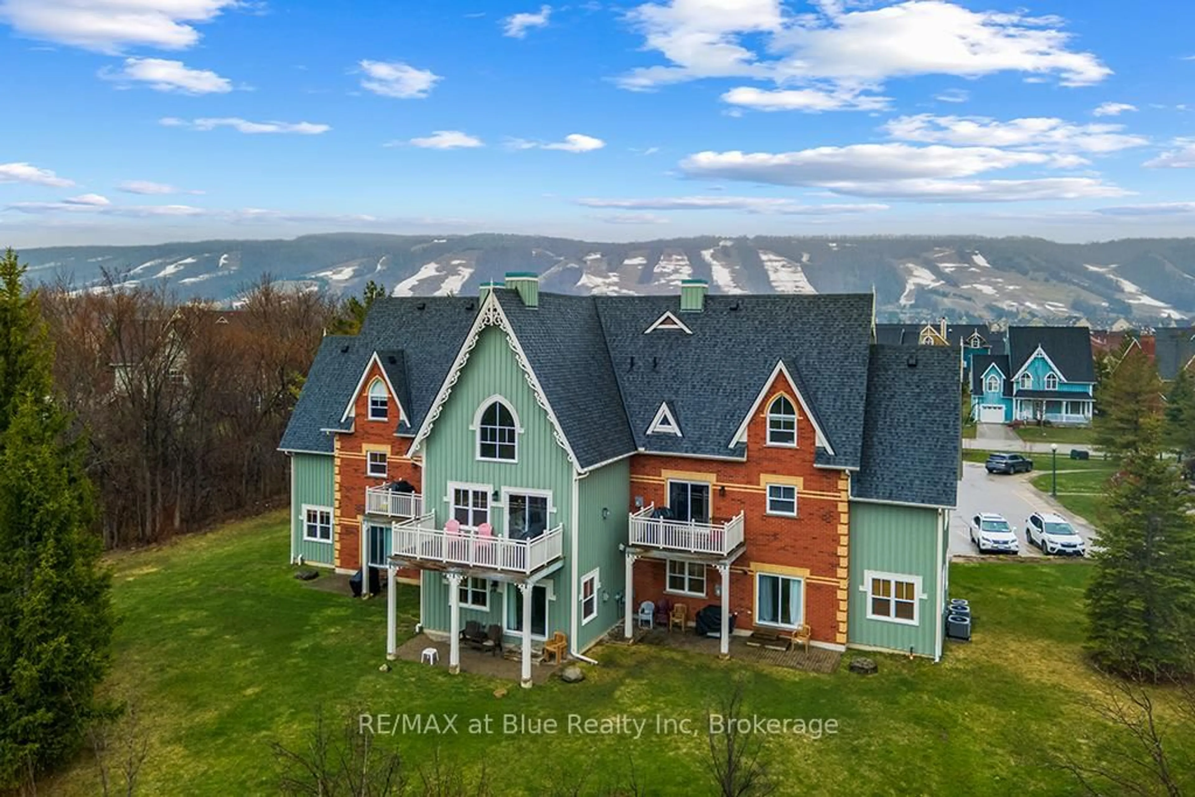 A pic from outside/outdoor area/front of a property/back of a property/a pic from drone, water/lake/river/ocean view for 170 Snowbridge Way #222, Blue Mountains Ontario L9Y 0V1