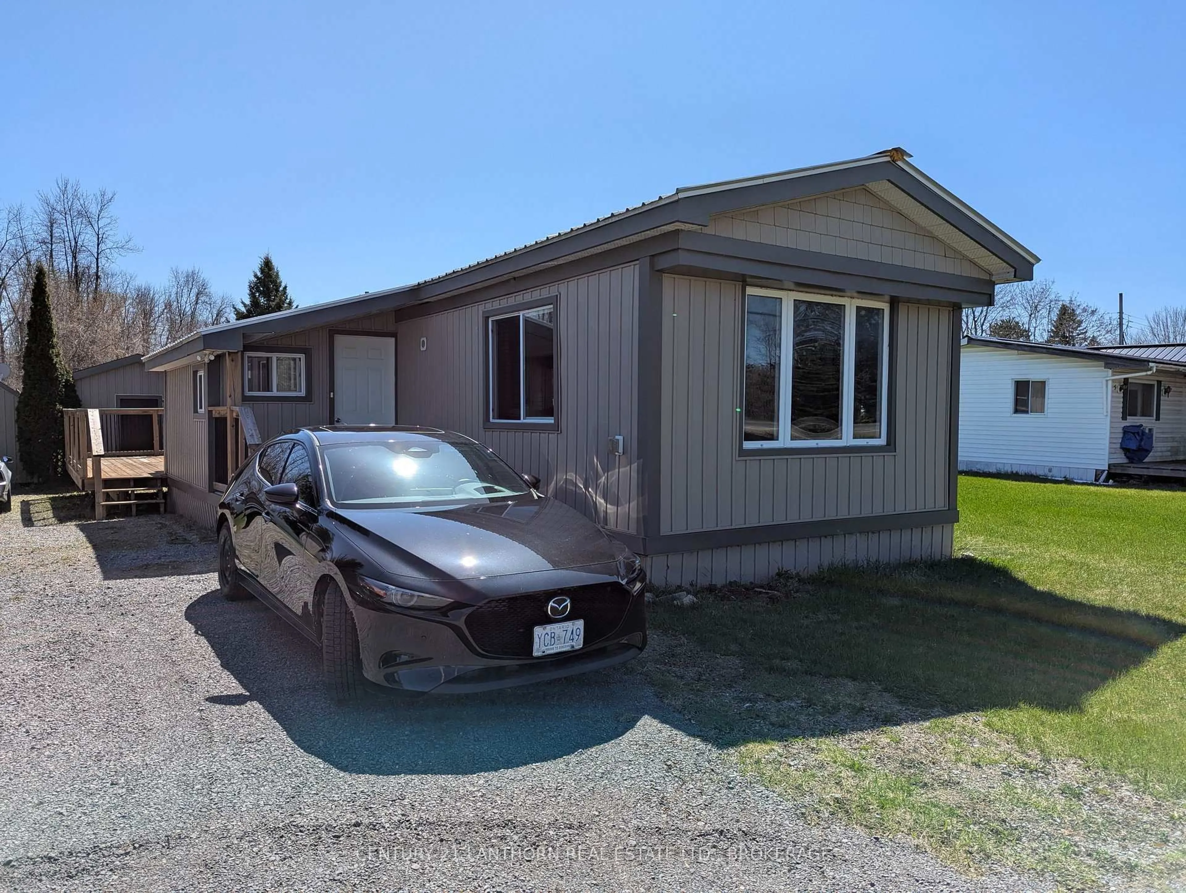 Home with vinyl exterior material, street for 4417 Front St, Verona Ontario K0H 2W0
