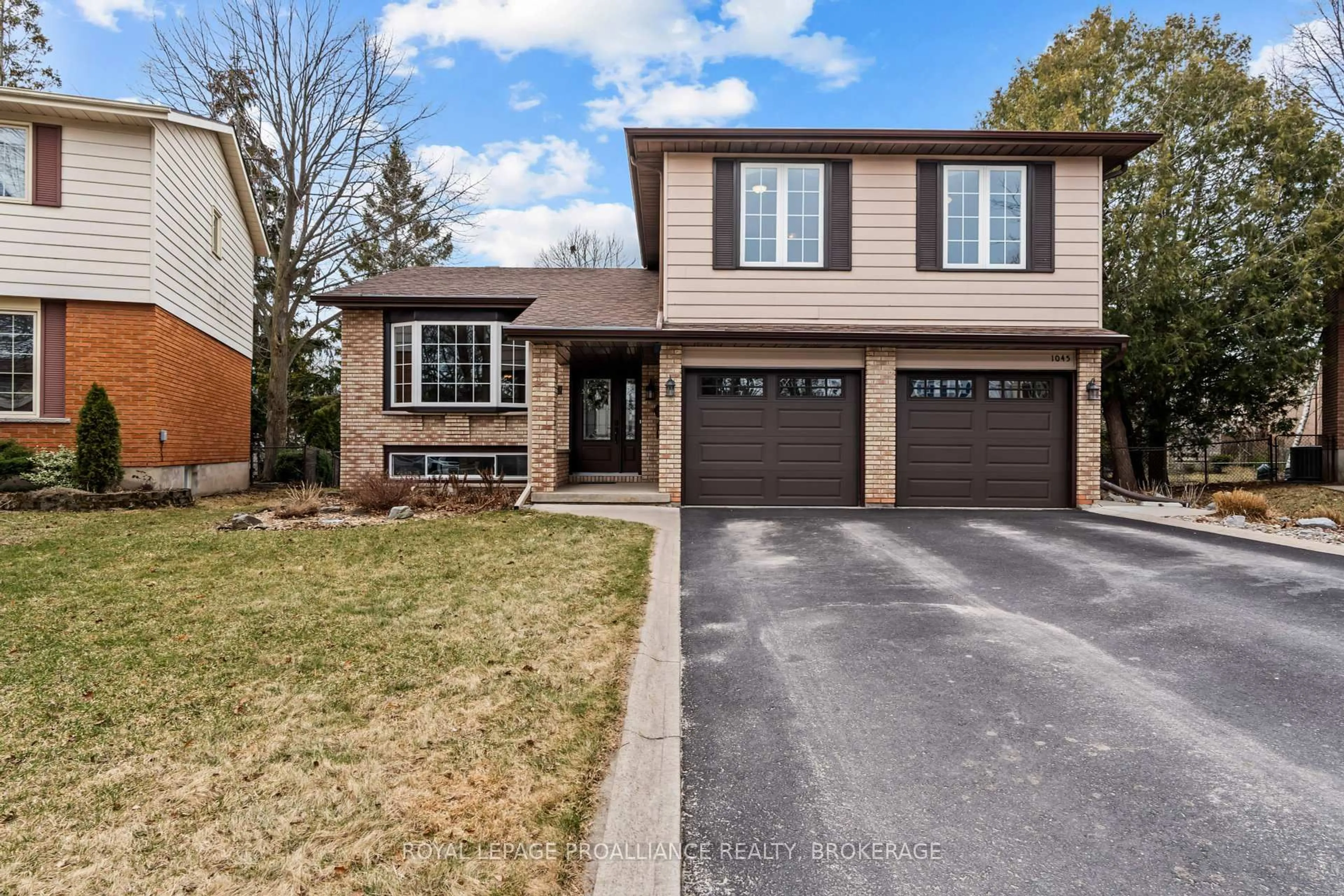 Home with brick exterior material, street for 1045 Lawton Pl, Kingston Ontario K7P 1M2