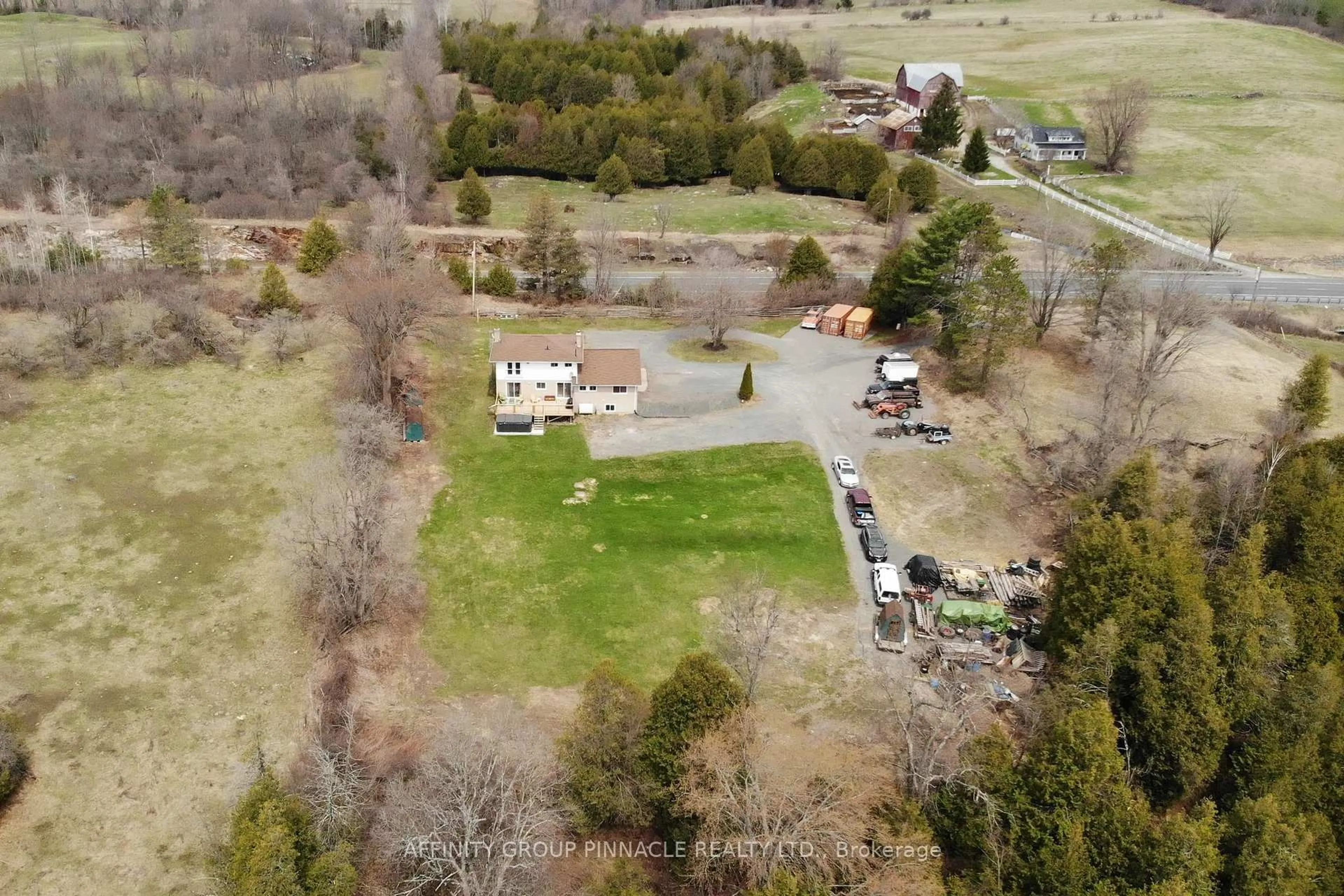 A pic from outside/outdoor area/front of a property/back of a property/a pic from drone, unknown for 106914 Hwy 7 Highway, Madoc Ontario K0K 2K0