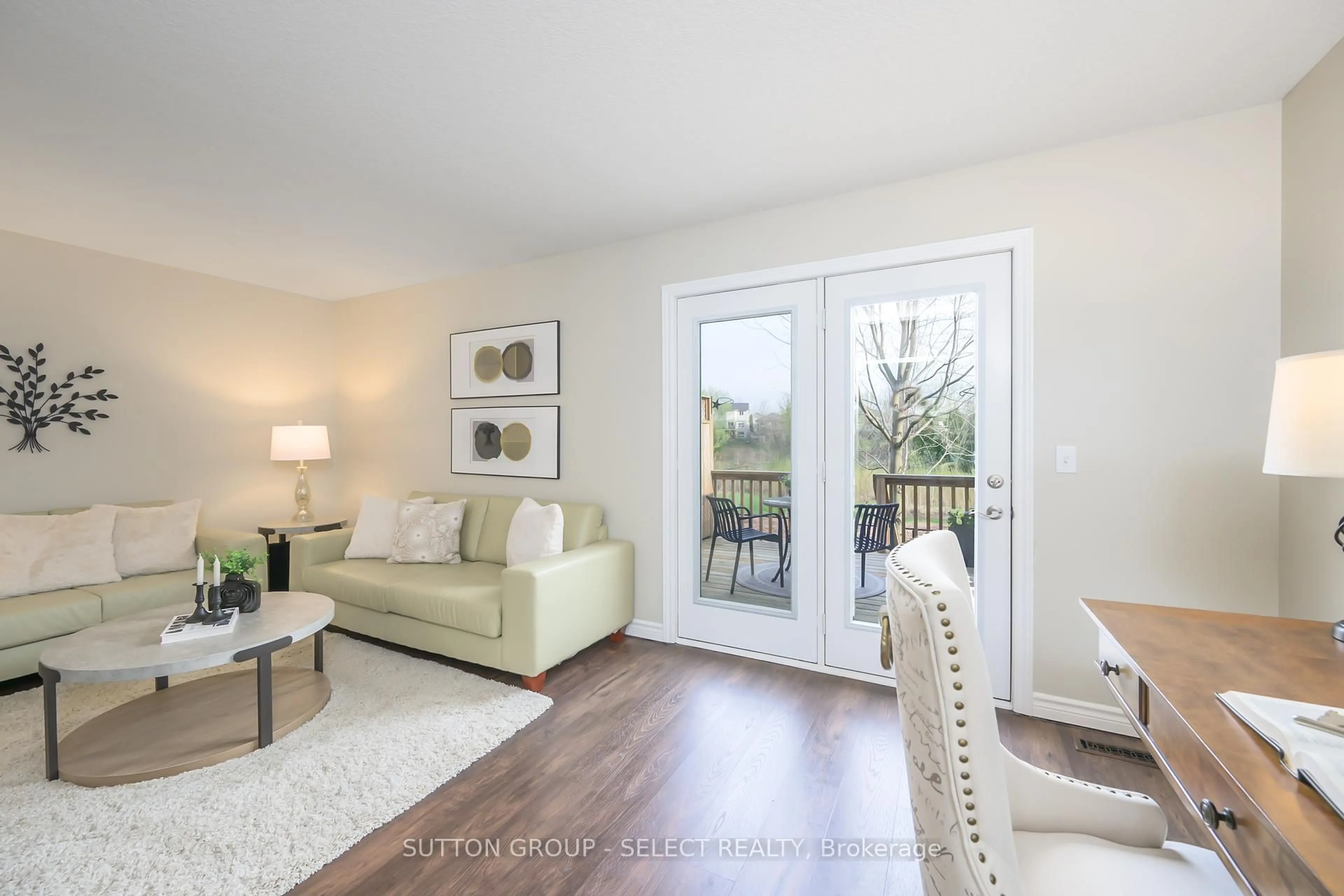 Living room with furniture, wood/laminate floor for 1010 Fanshawe Park Rd #75, London North Ontario N5X 0K9