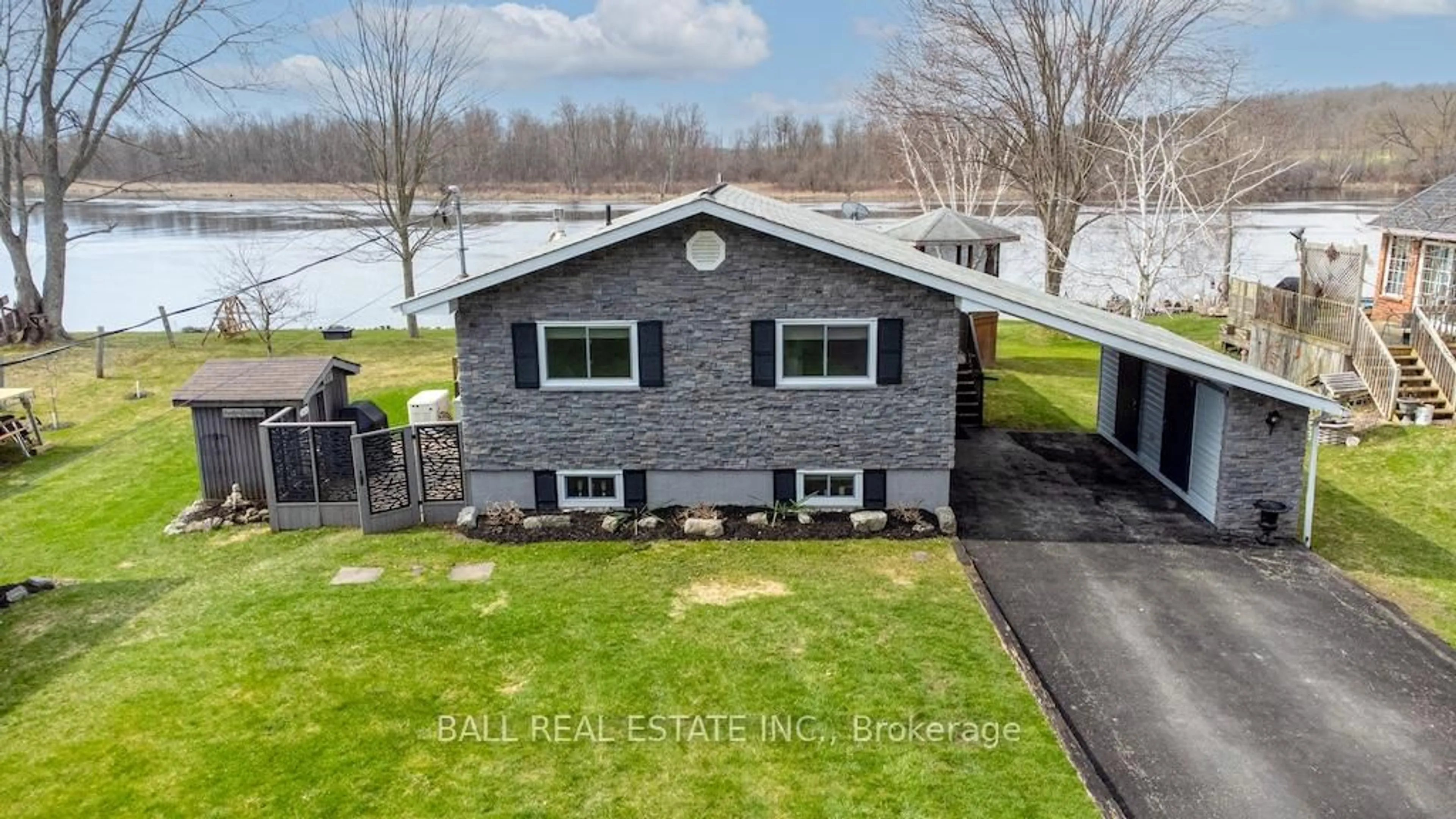 A pic from outside/outdoor area/front of a property/back of a property/a pic from drone, water/lake/river/ocean view for 142 Rodgers Rd, Trent Hills Ontario K0K 2C0