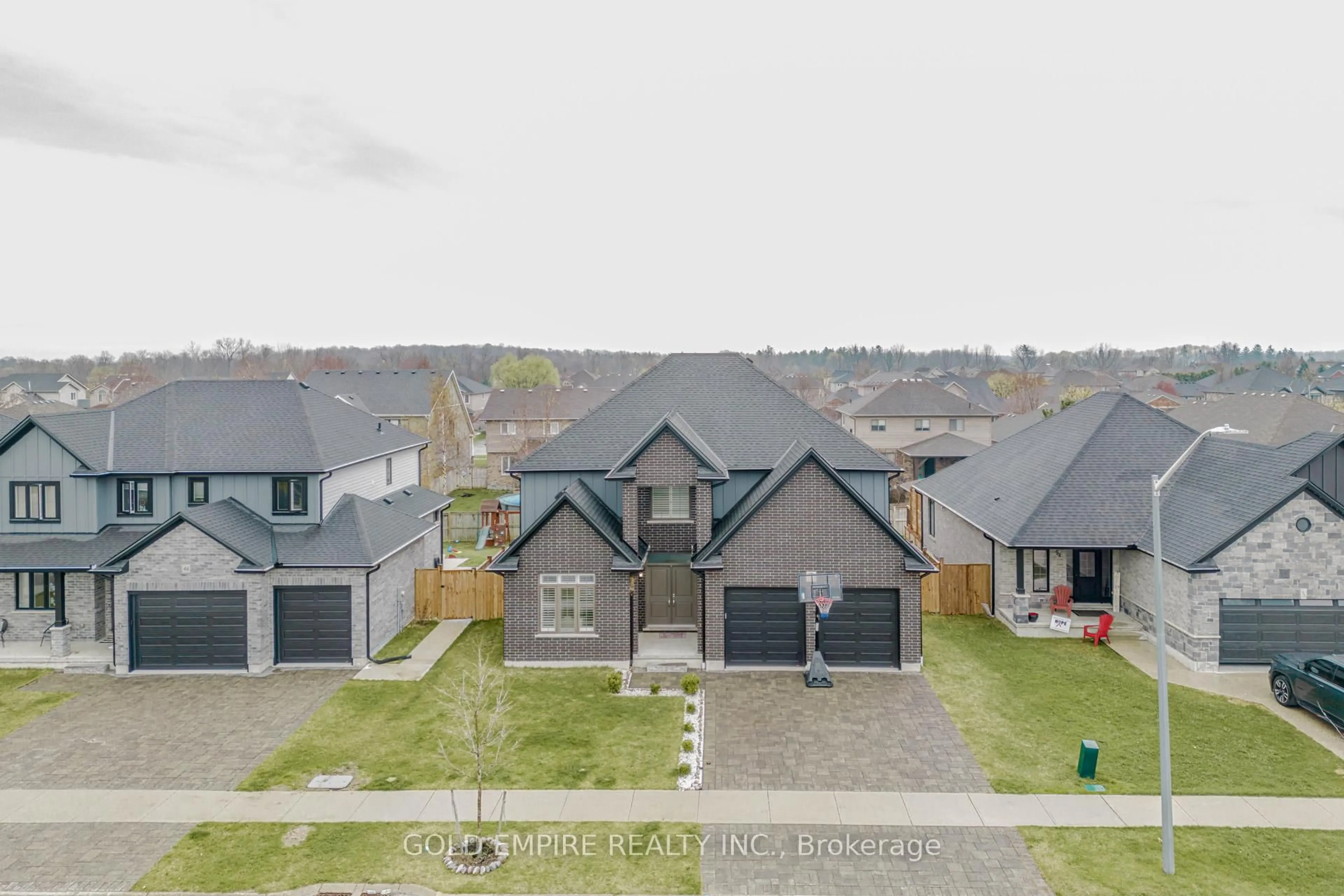 A pic from outside/outdoor area/front of a property/back of a property/a pic from drone, street for 50 Thames Springs Cres, Zorra Ontario N0M 2M0