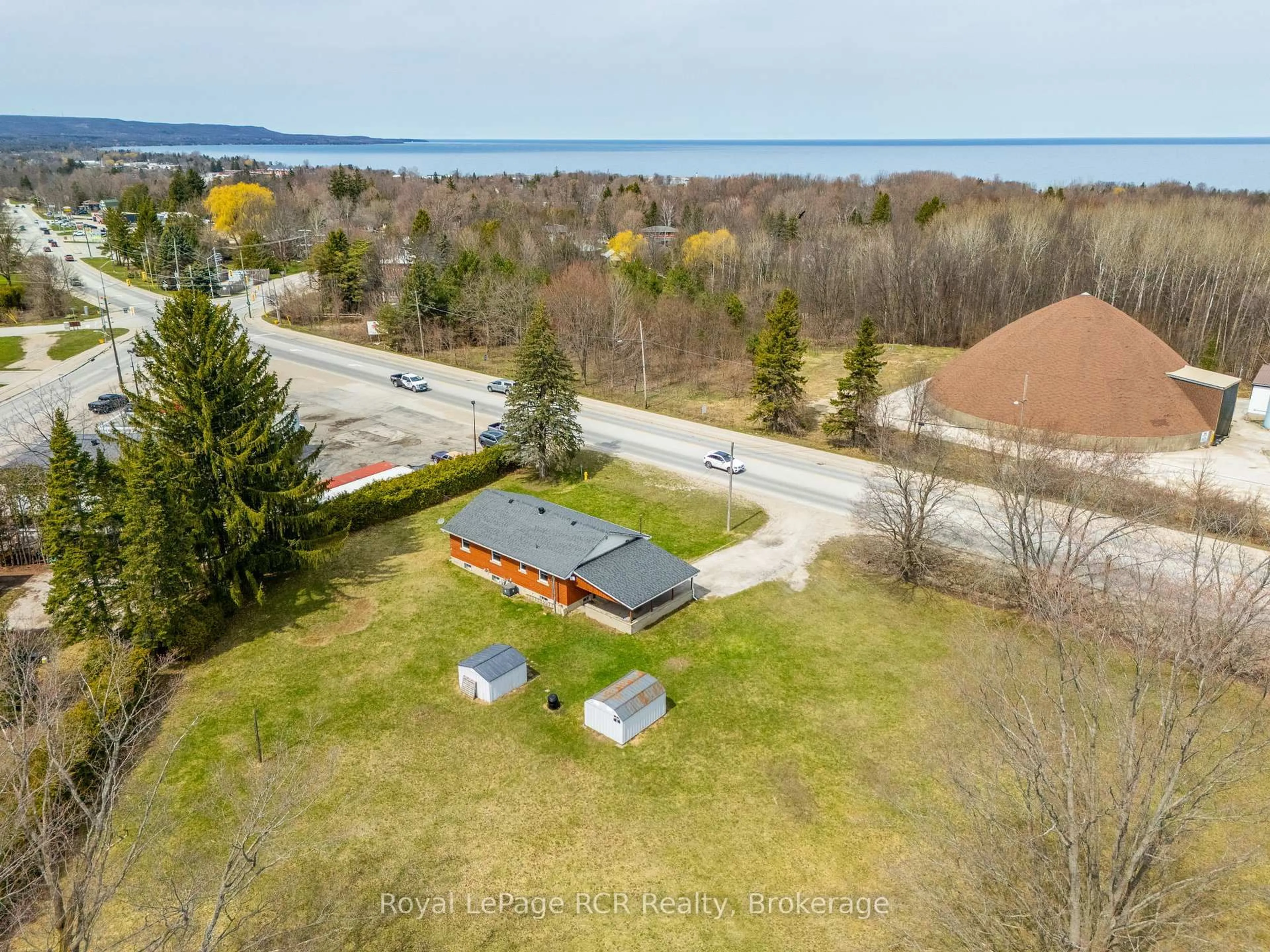 A pic from outside/outdoor area/front of a property/back of a property/a pic from drone, water/lake/river/ocean view for 456 Sykes St, Meaford Ontario N4L 1C6