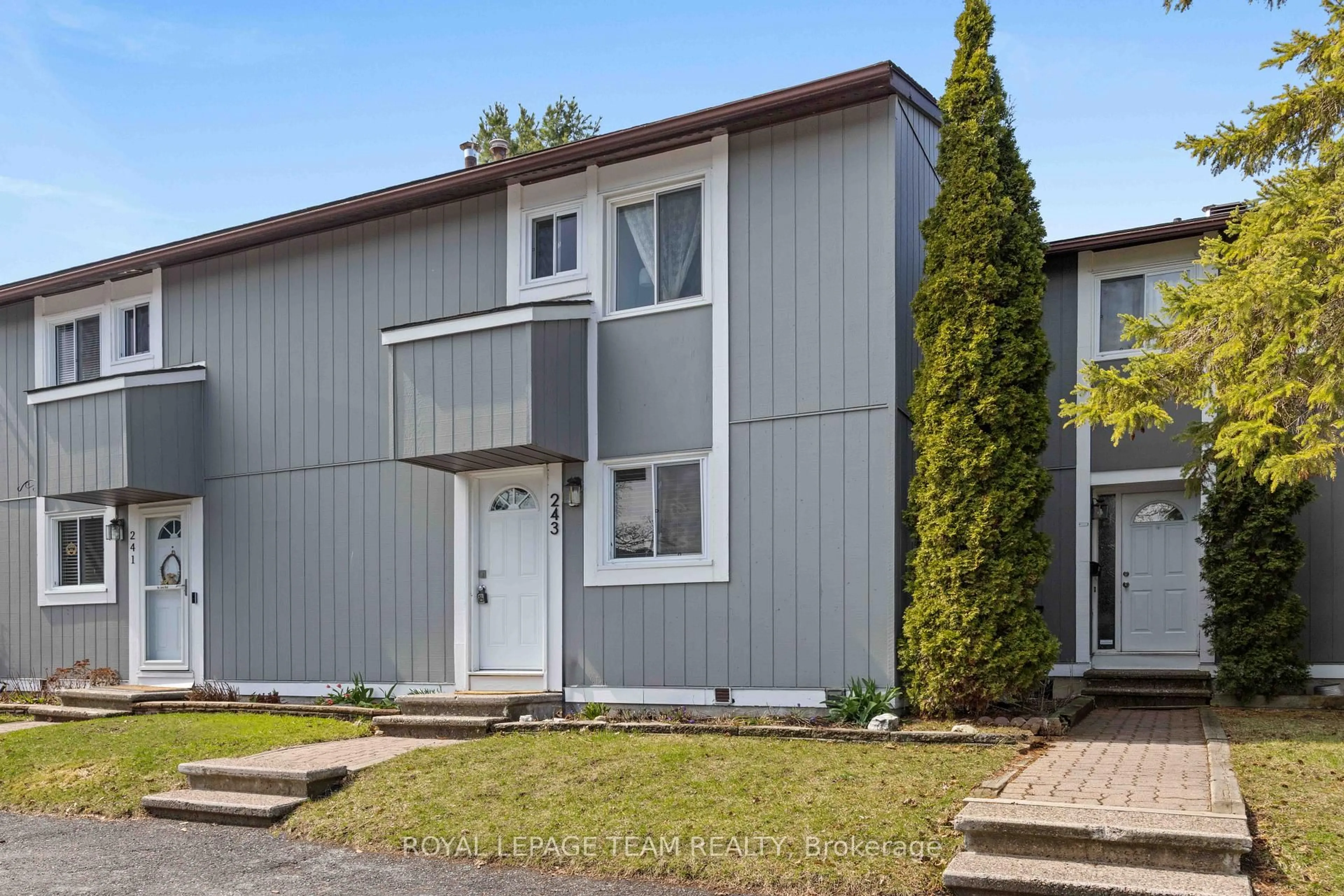 Home with vinyl exterior material, street for 243 Thistledown Crt #33, Ottawa Ontario K2J 1N1