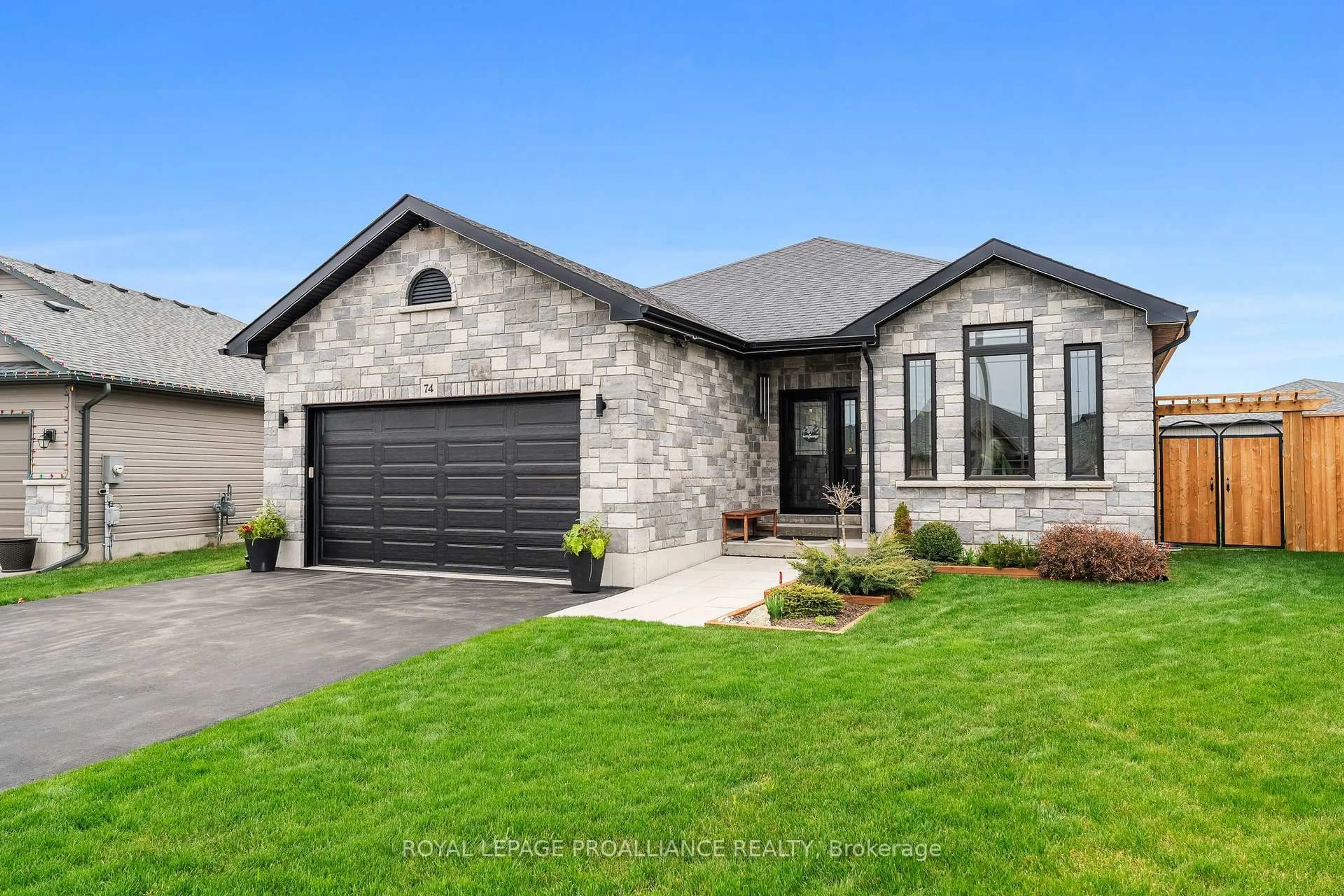 Home with brick exterior material, street for 74 Deacon Pl, Belleville Ontario K8P 5G4