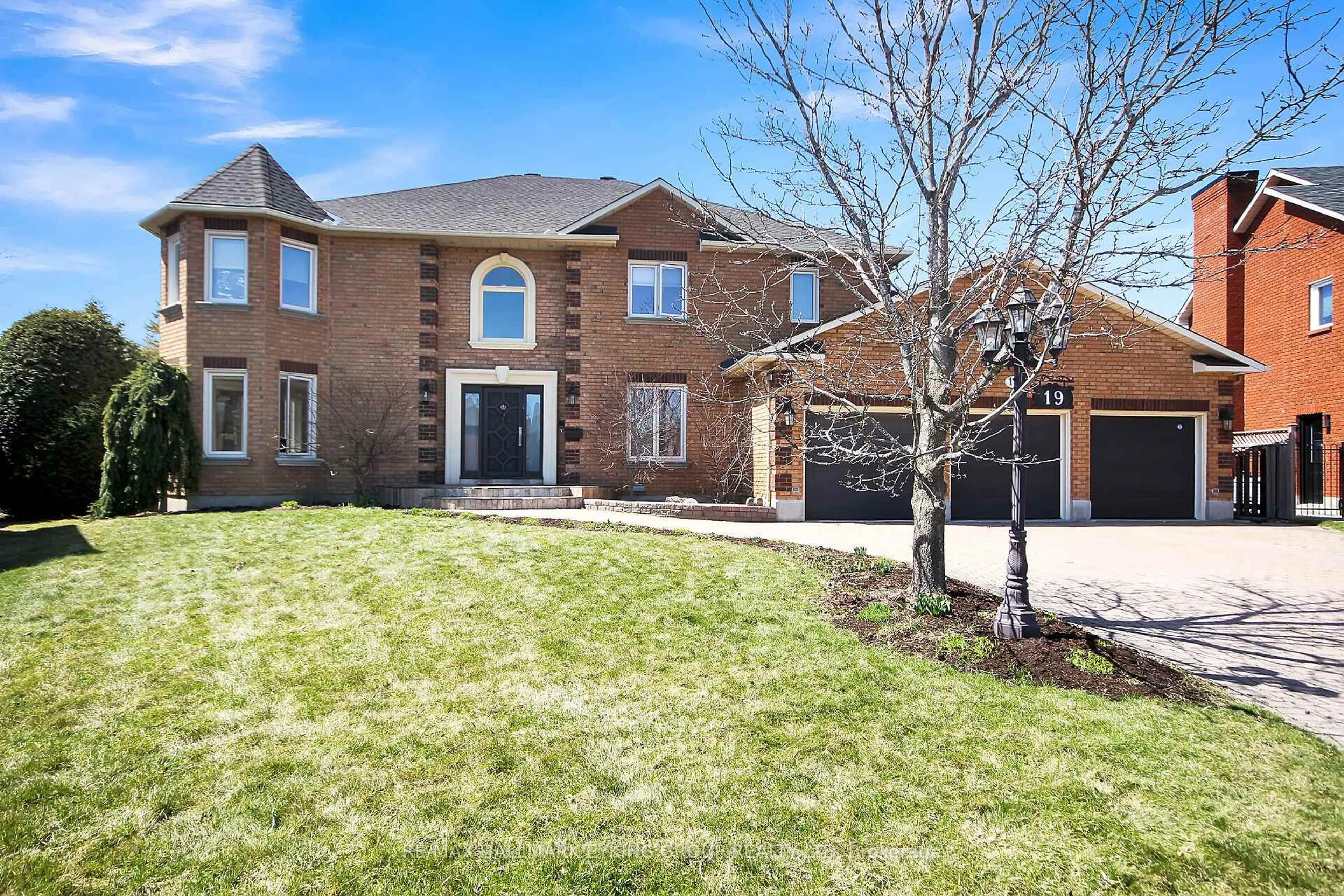 Home with brick exterior material, street for 19 Campfield Crt, Ottawa Ontario K2E 7X8