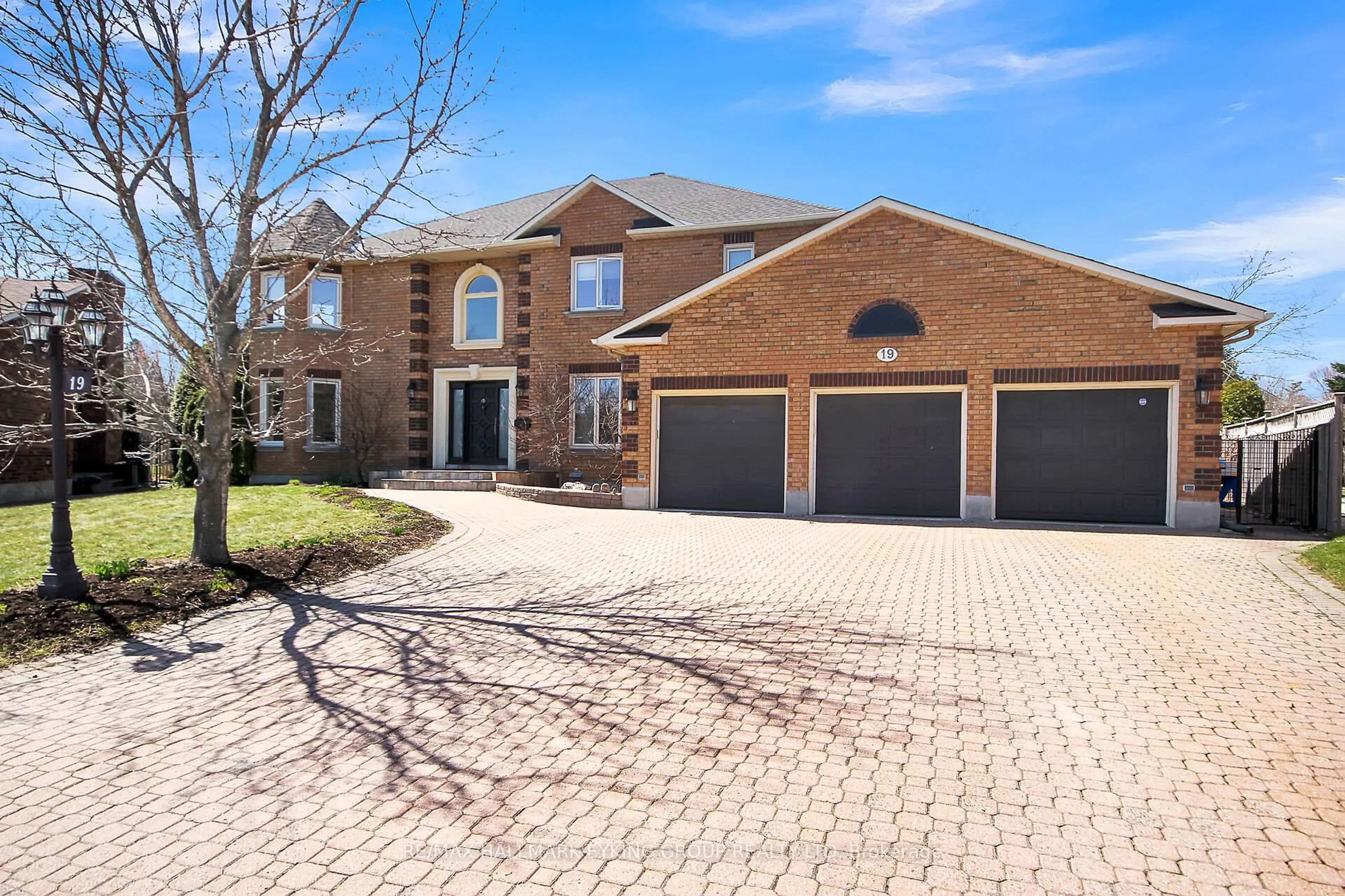 Home with brick exterior material, street for 19 Campfield Crt, Ottawa Ontario K2E 7X8