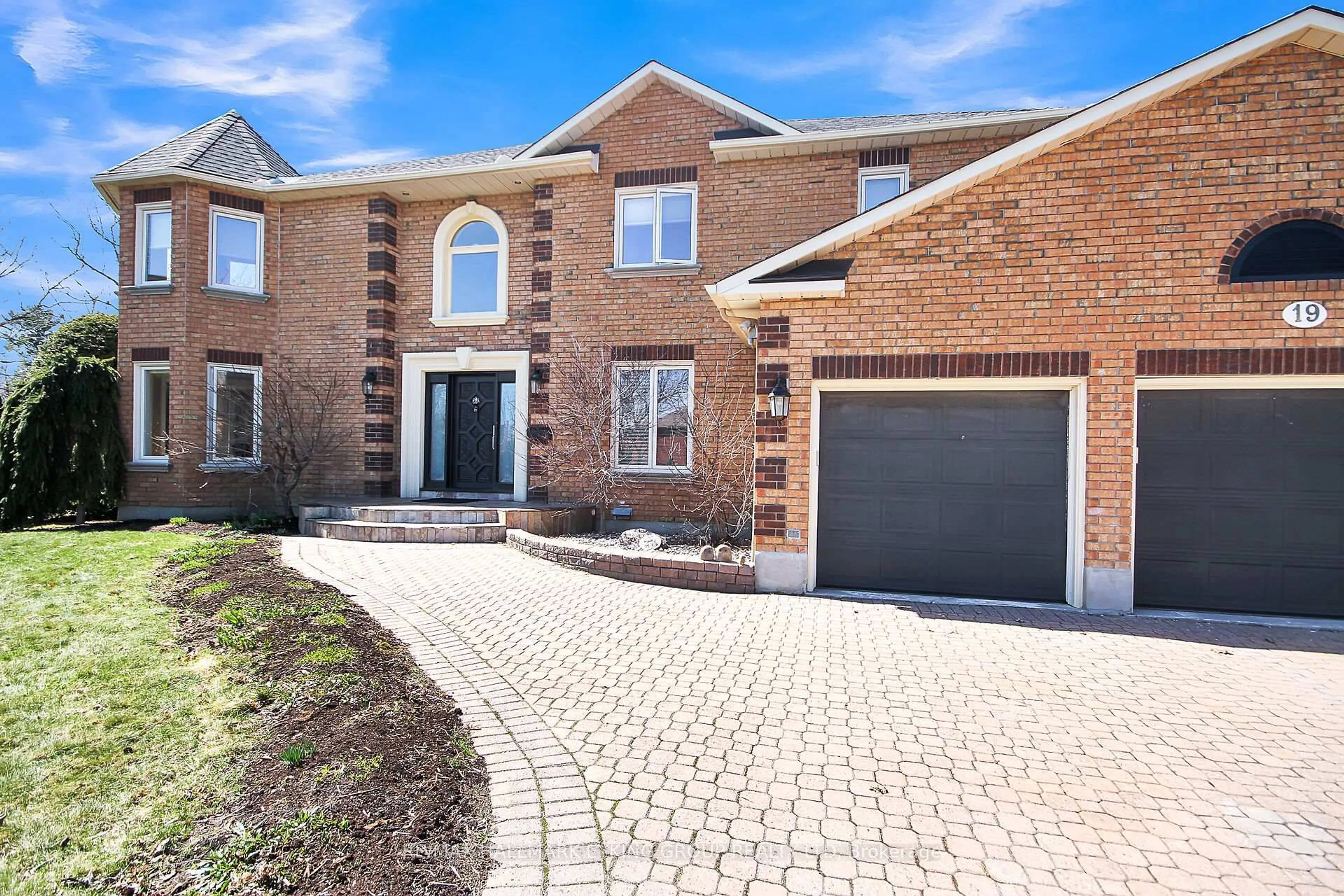 Home with brick exterior material, street for 19 Campfield Crt, Ottawa Ontario K2E 7X8