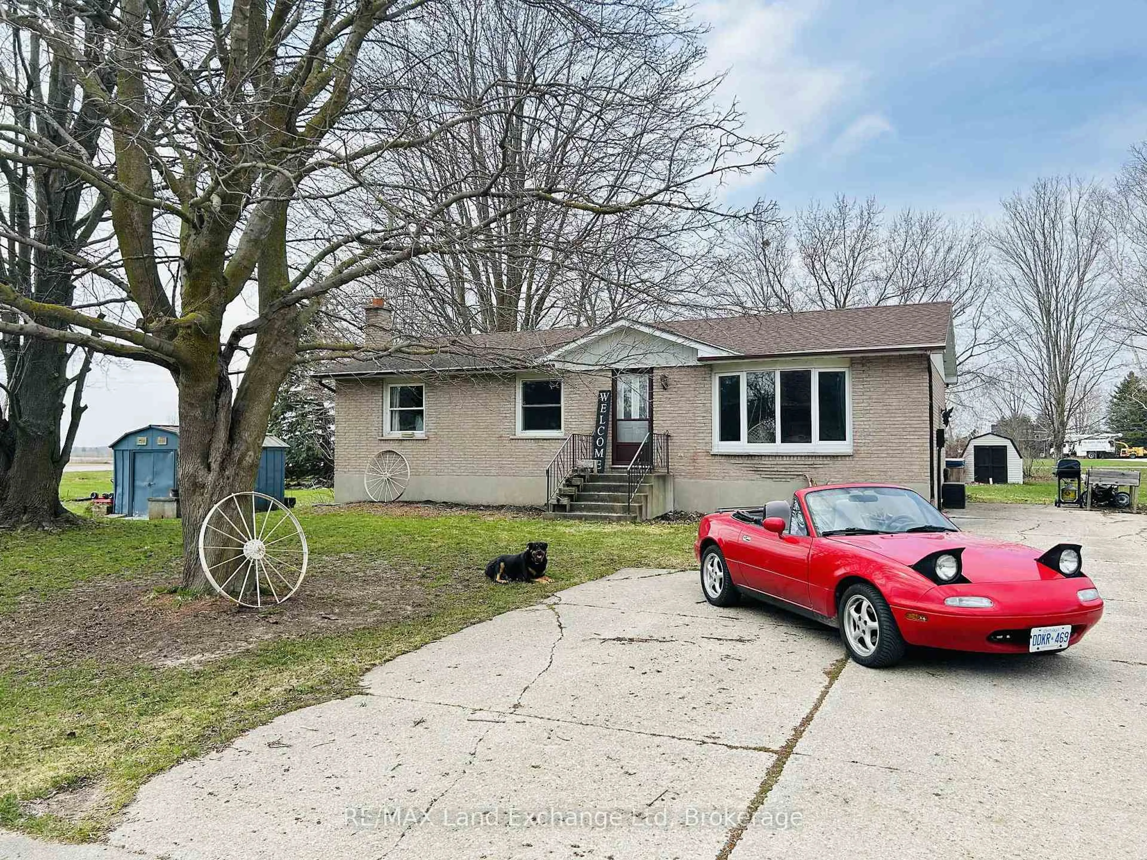 A pic from outside/outdoor area/front of a property/back of a property/a pic from drone, street for 86731 Fischer Line, Morris Turnberry Ontario N0G 2W0
