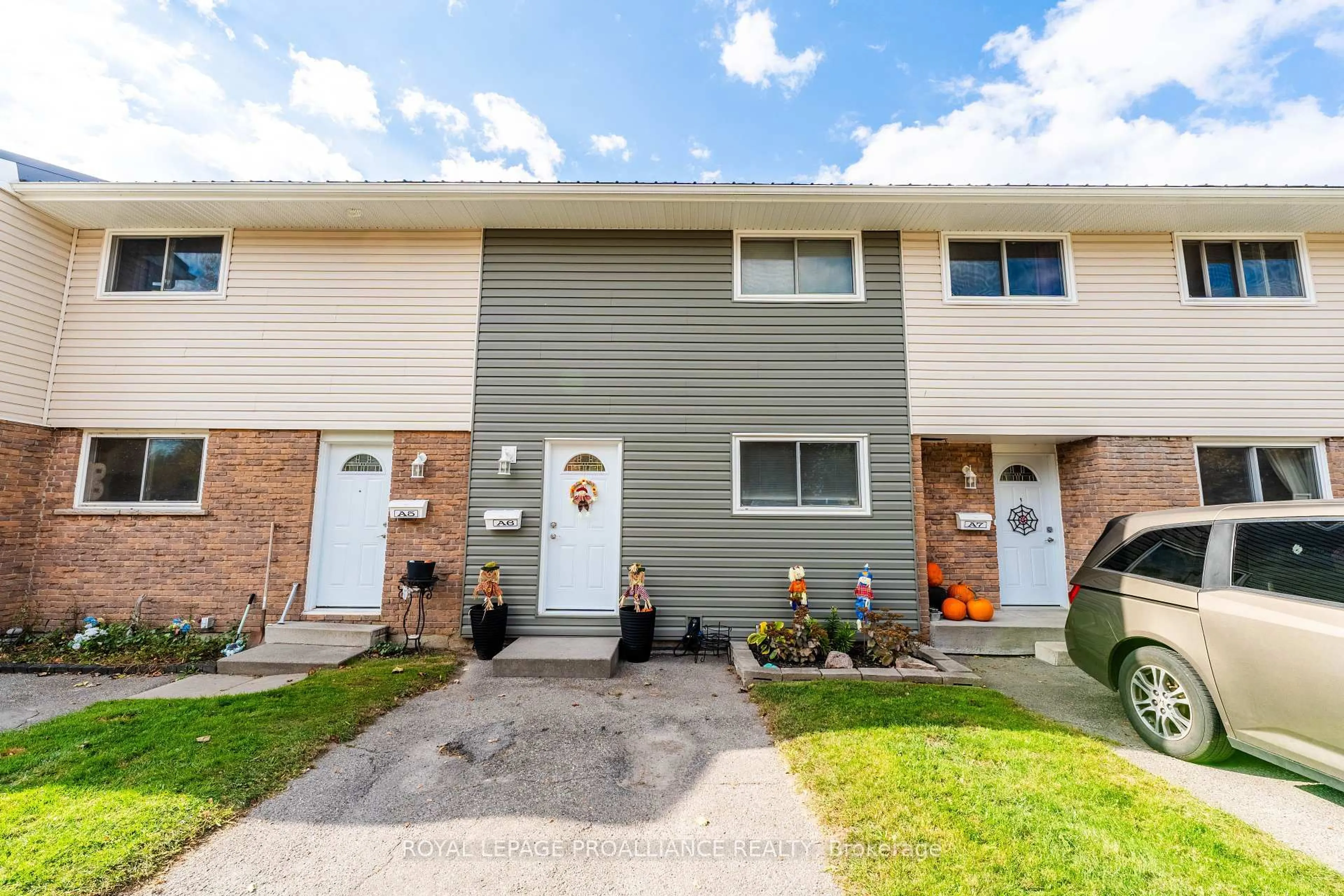 Home with vinyl exterior material, street for 400 Westwood Dr #A6, Cobourg Ontario K9A 2B6