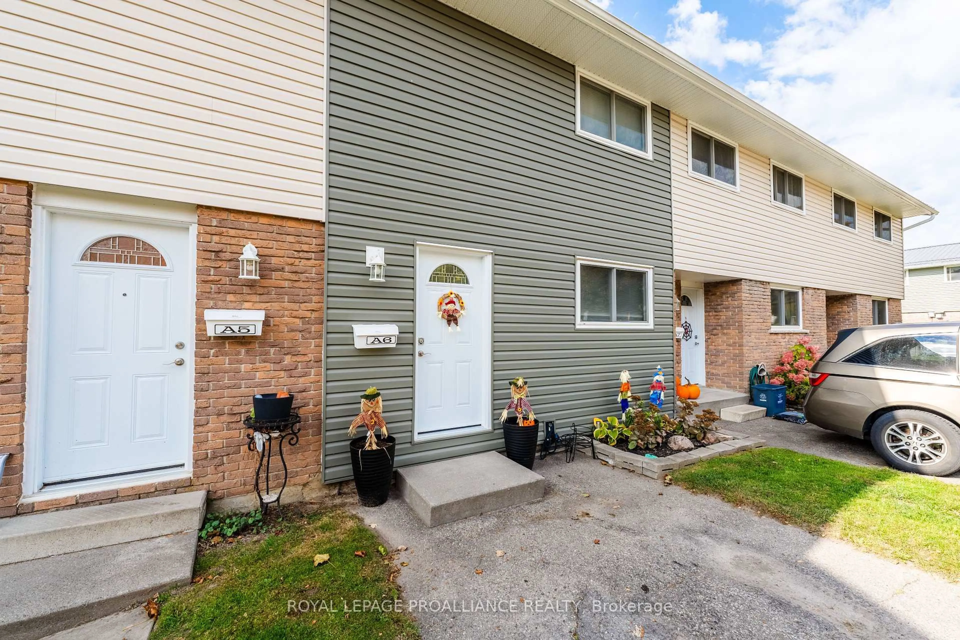 Home with vinyl exterior material, street for 400 Westwood Dr #A6, Cobourg Ontario K9A 2B6