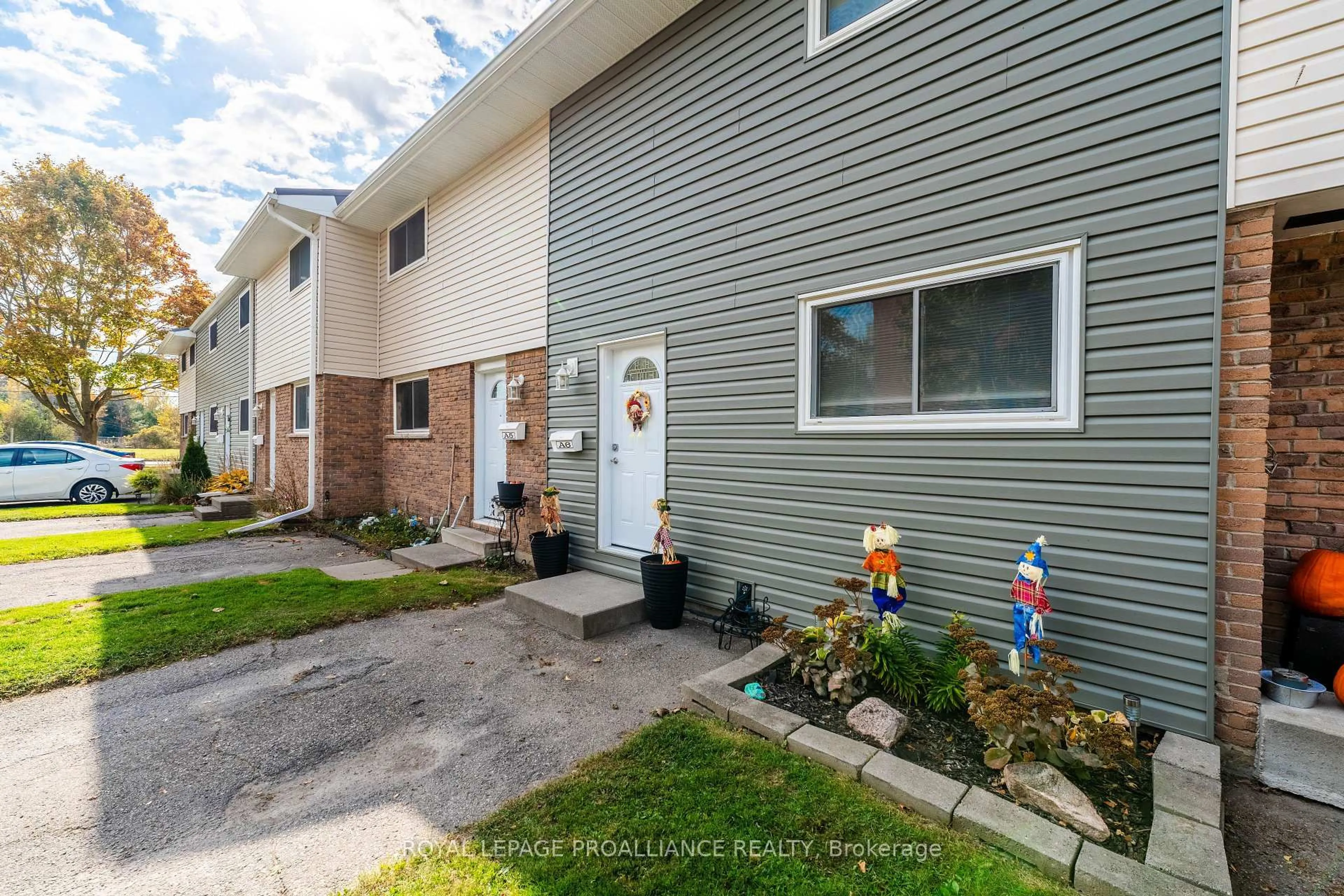 Home with vinyl exterior material, street for 400 Westwood Dr #A6, Cobourg Ontario K9A 2B6