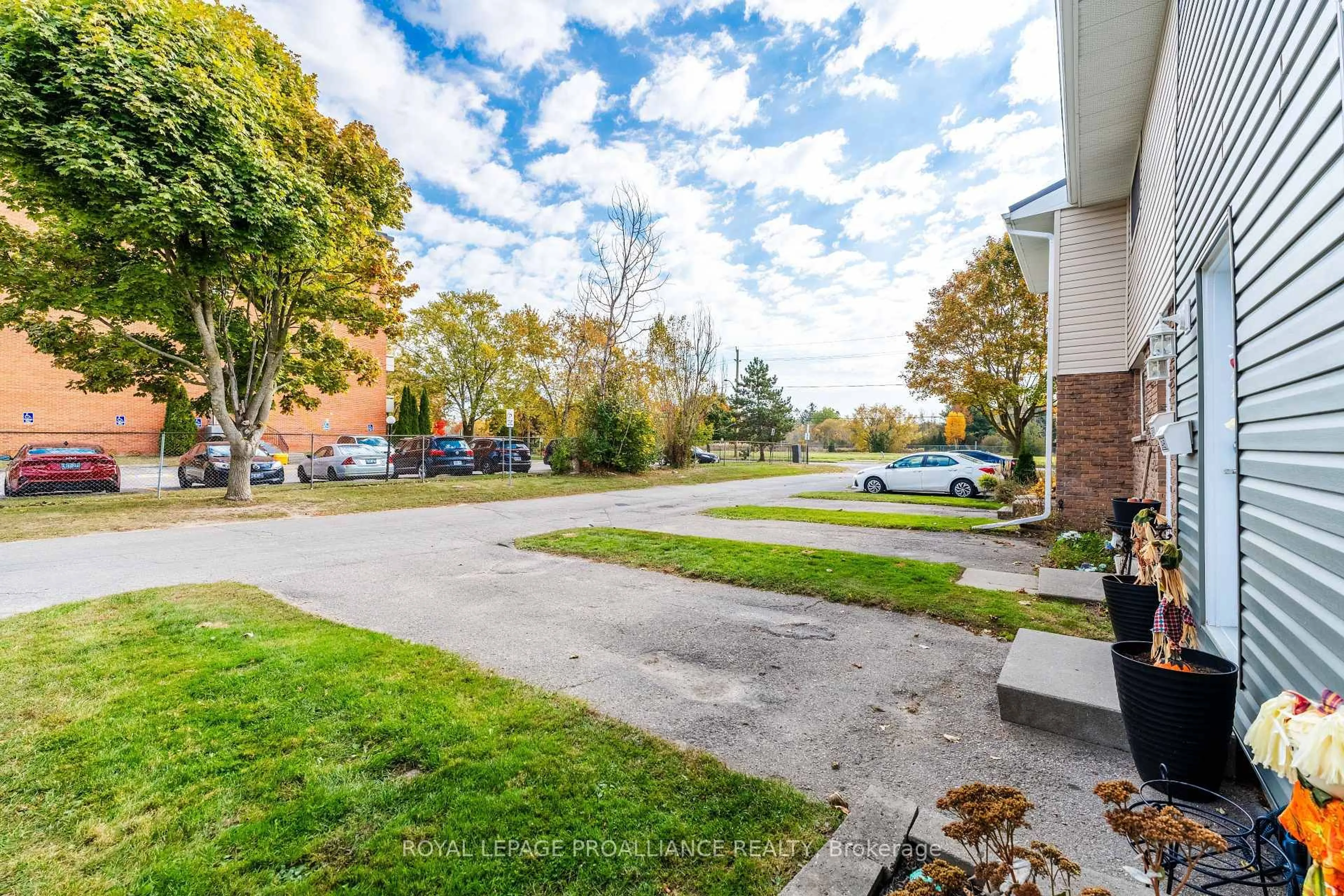 A pic from outside/outdoor area/front of a property/back of a property/a pic from drone, street for 400 Westwood Dr #A6, Cobourg Ontario K9A 2B6