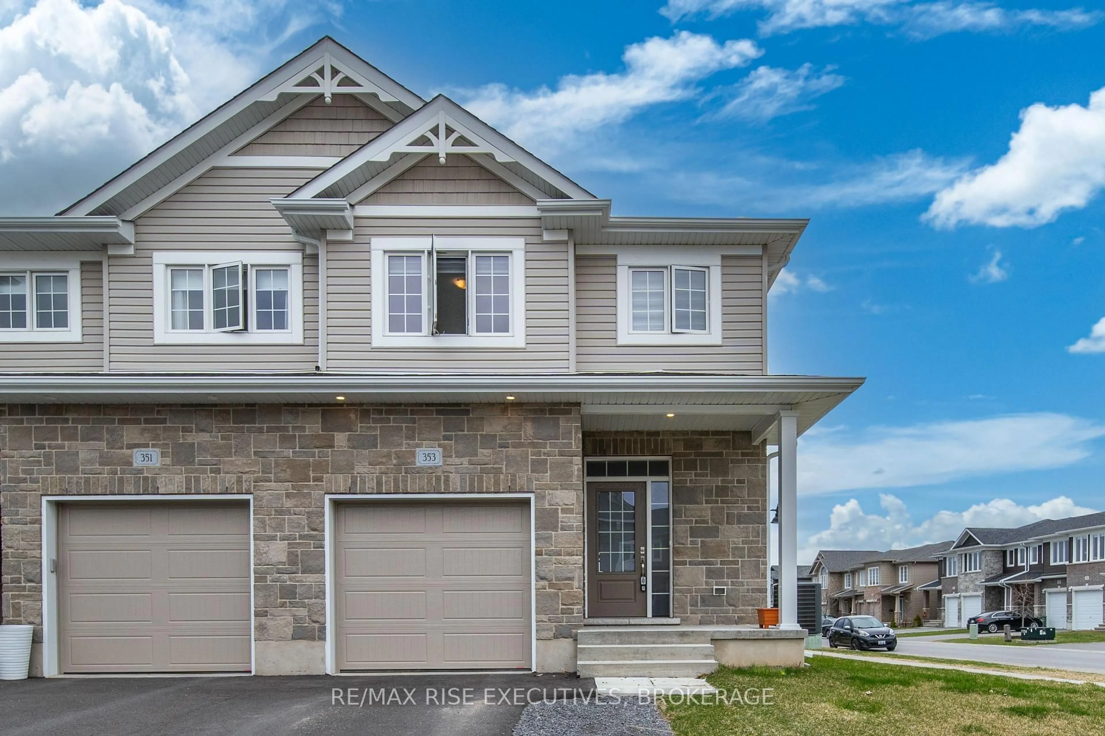 Home with vinyl exterior material, street for 353 Buckthorn Dr, Kingston Ontario K7P 0S1