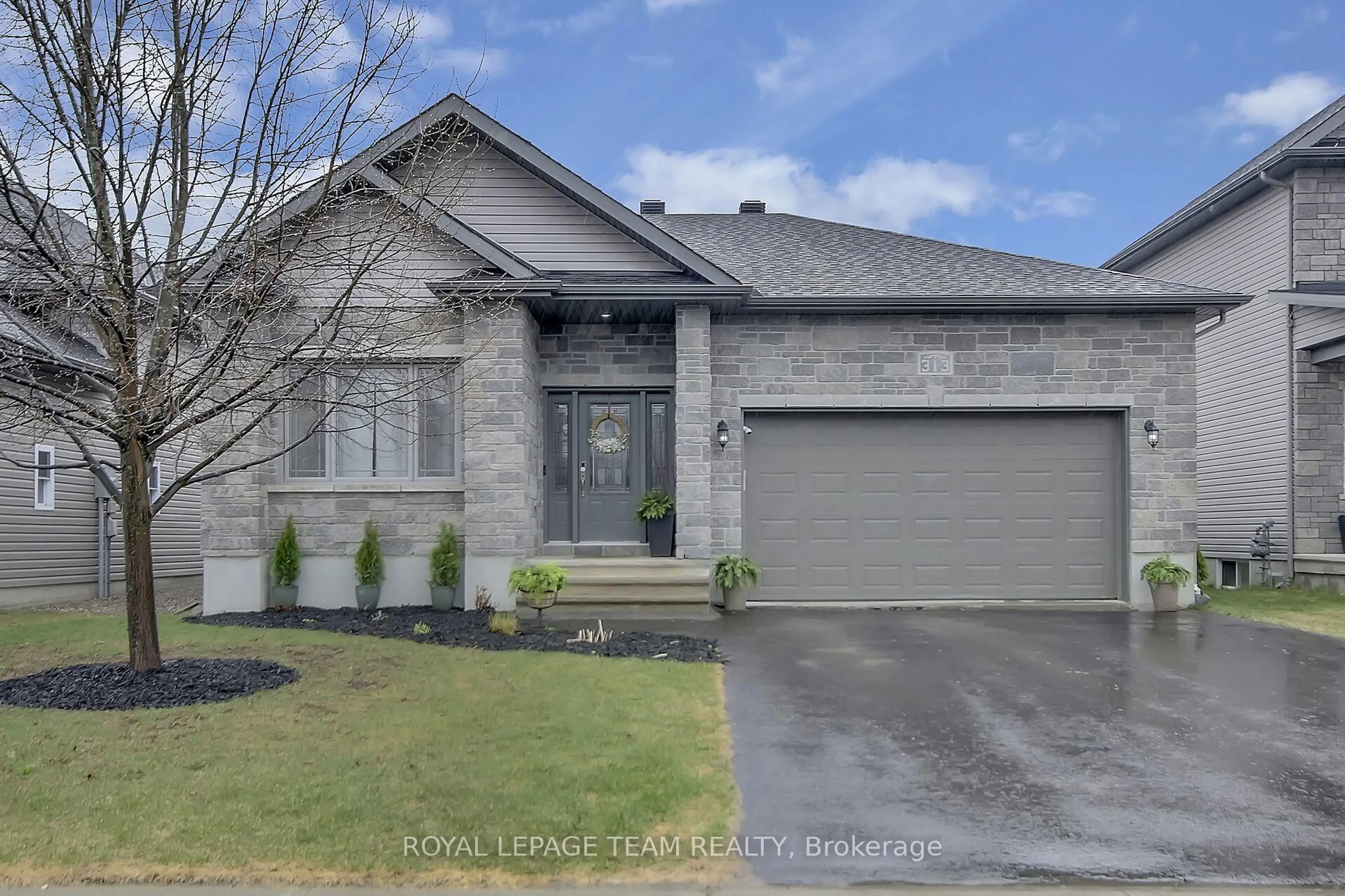 Home with brick exterior material, street for 313 Colmar St, Russell Ontario K0A 1W0