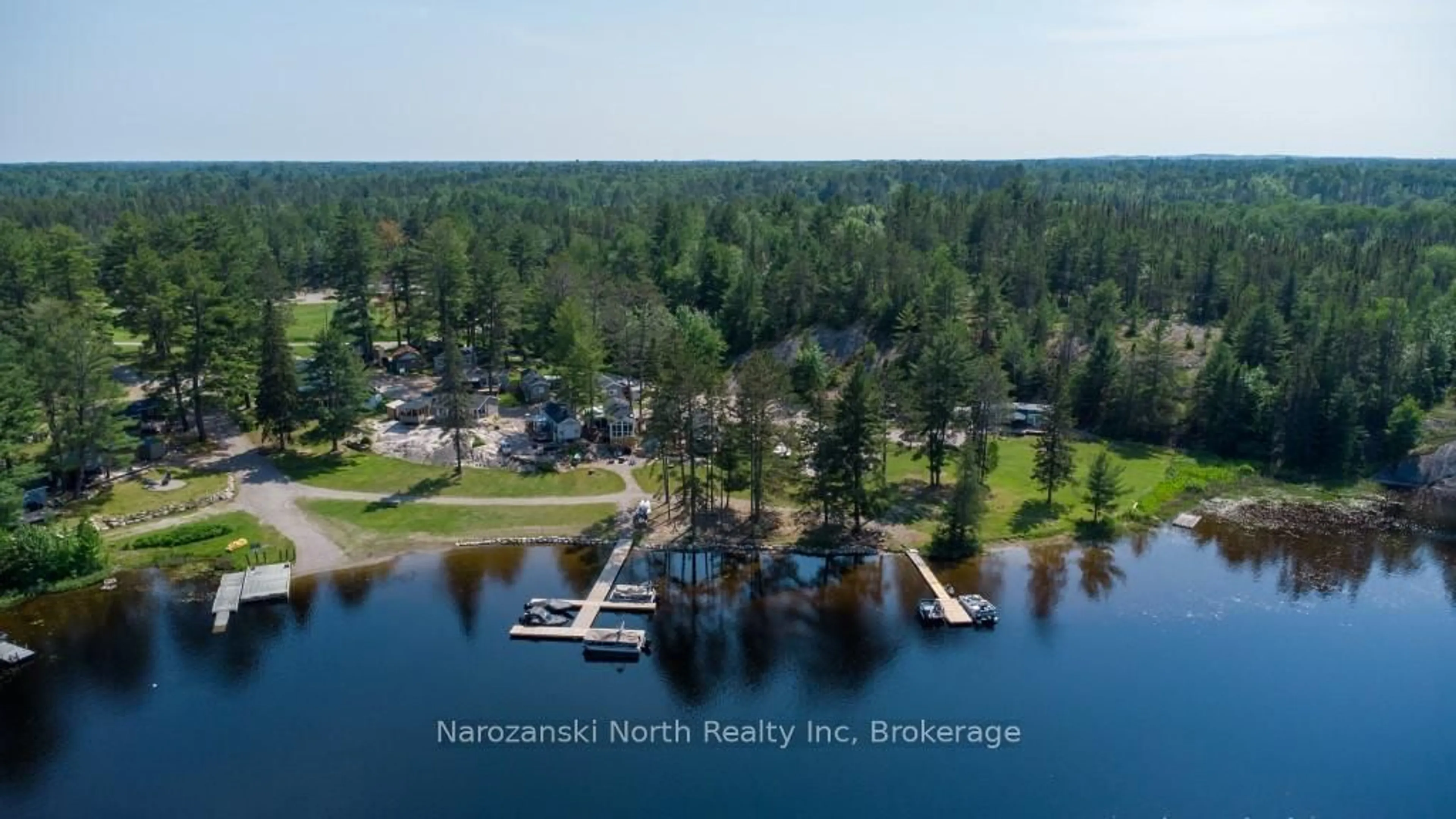 A pic from outside/outdoor area/front of a property/back of a property/a pic from drone, water/lake/river/ocean view for 120 Happy Landing Rd, French River Ontario P0M 2N0