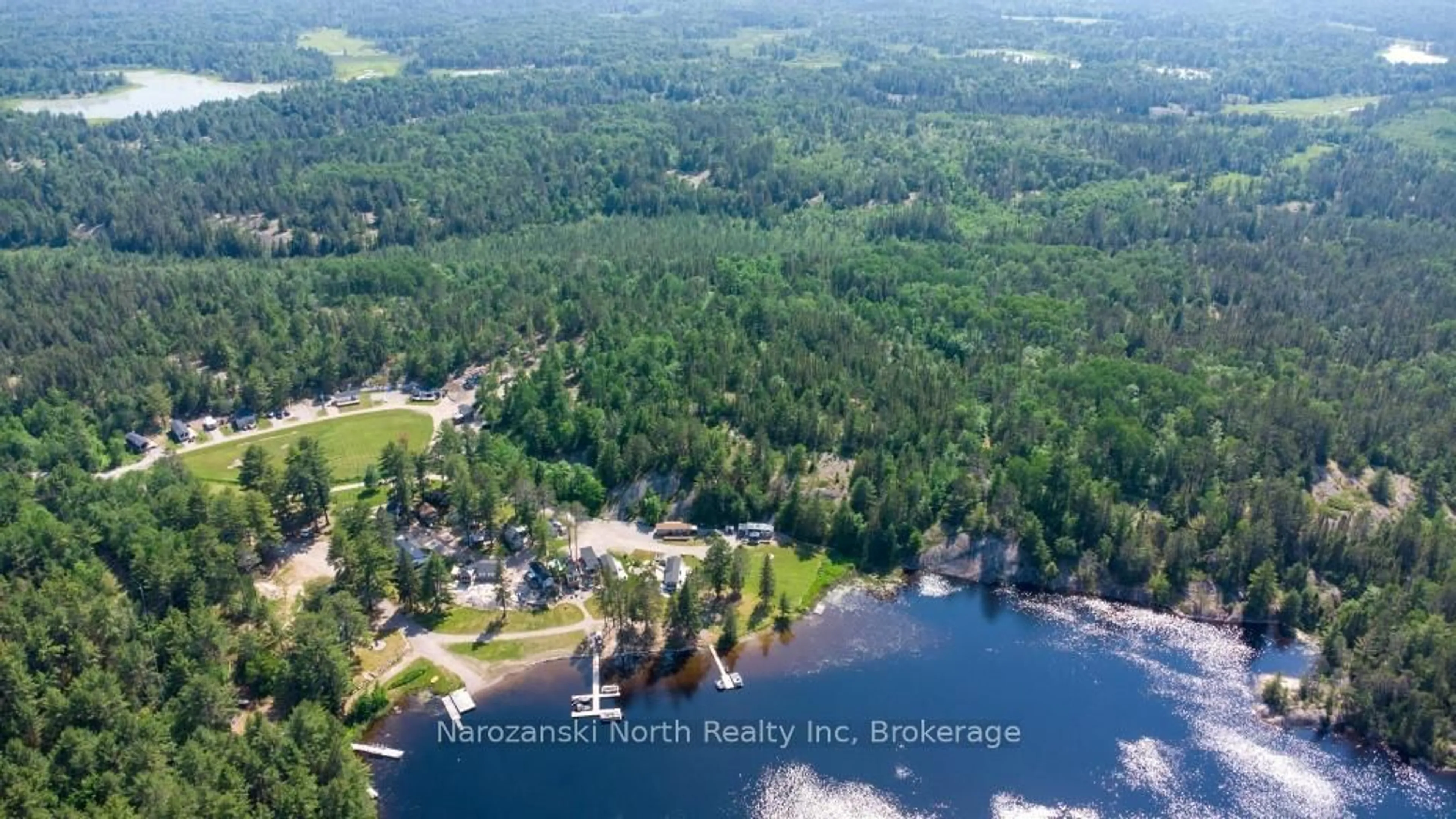 A pic from outside/outdoor area/front of a property/back of a property/a pic from drone, water/lake/river/ocean view for 120 Happy Landing Rd, French River Ontario P0M 2N0