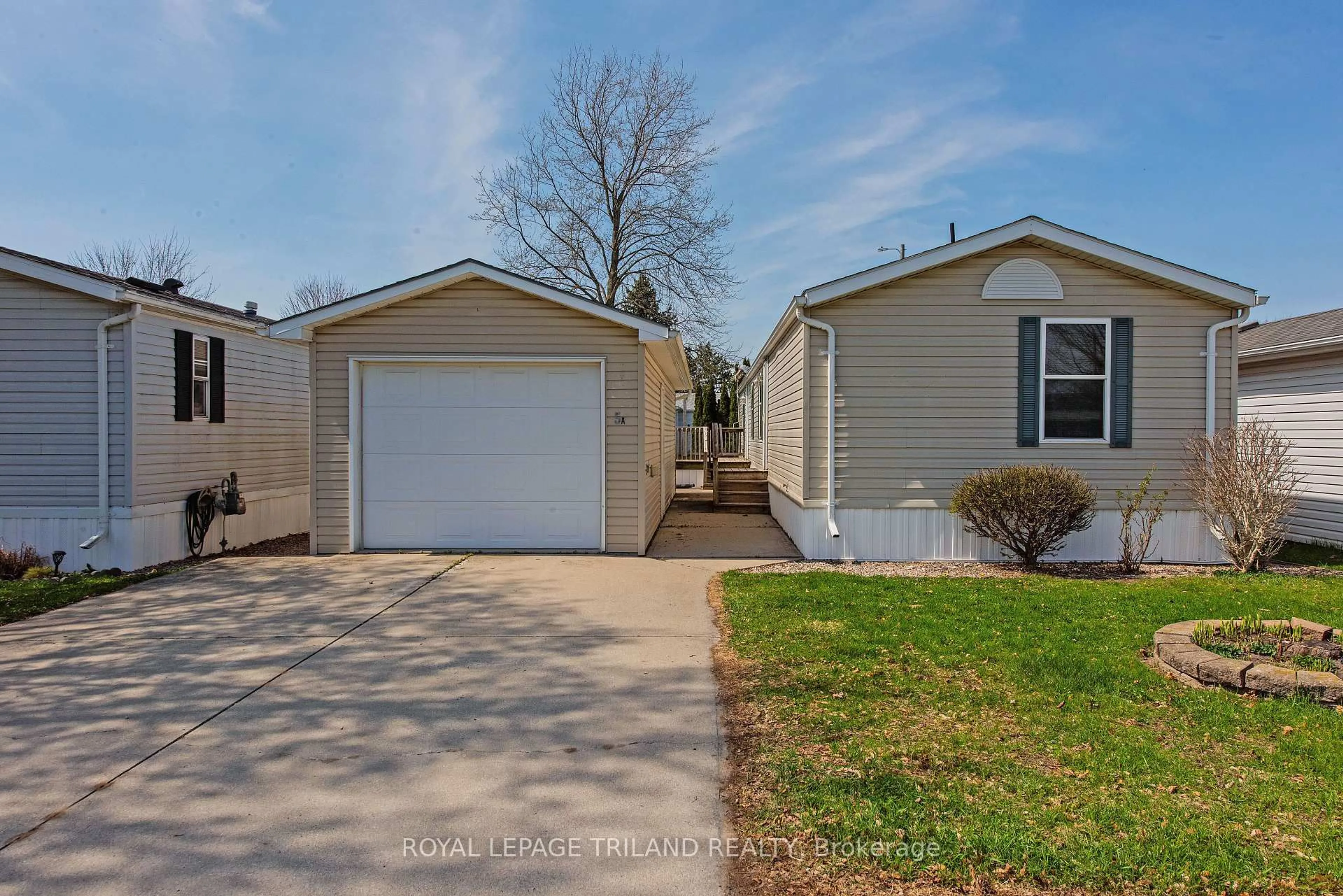 Home with vinyl exterior material, street for 5A Stewart St, Strathroy-Caradoc Ontario N7G 1A1