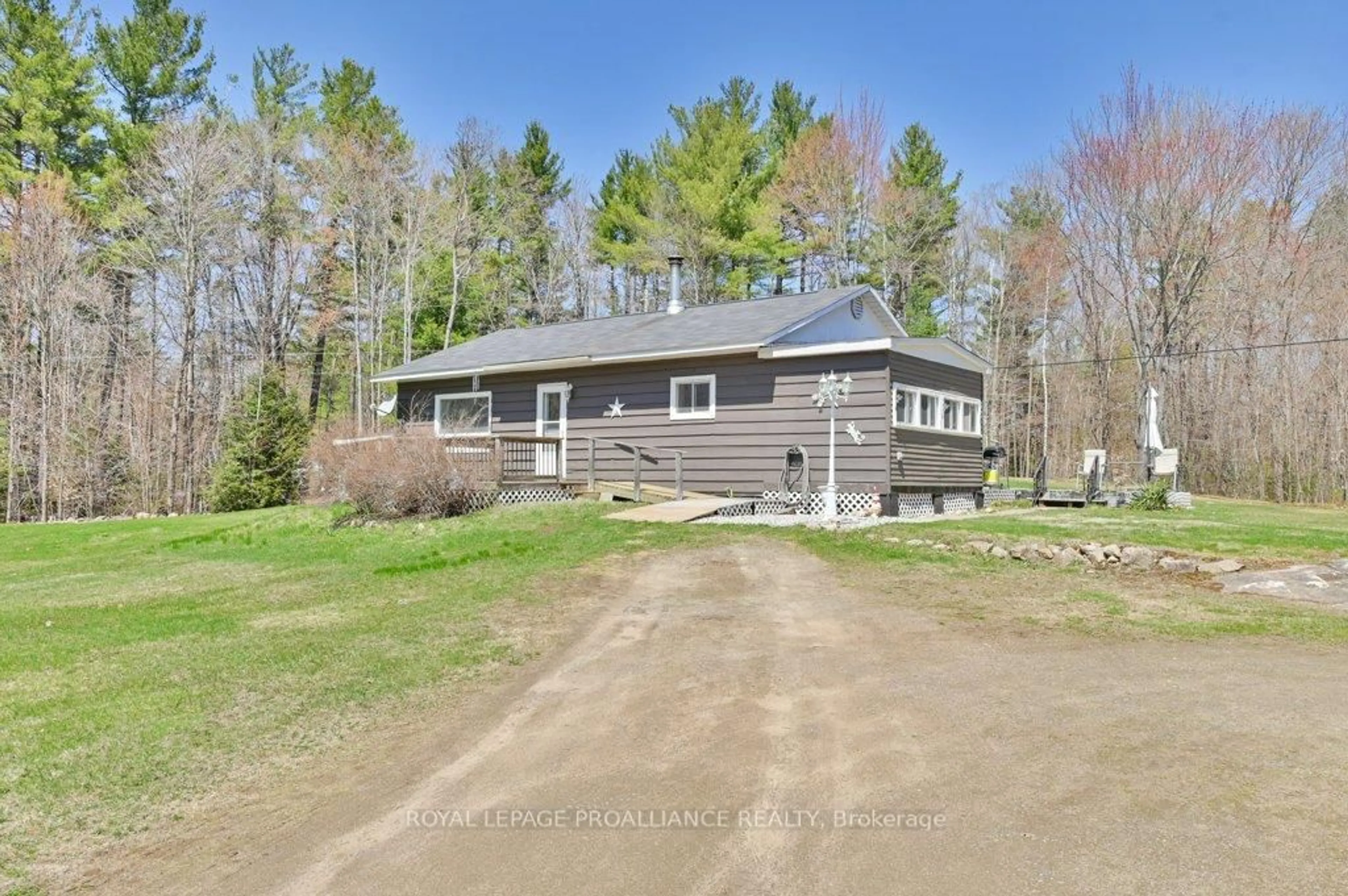 A pic from outside/outdoor area/front of a property/back of a property/a pic from drone, water/lake/river/ocean view for 708 Skootamatta Lake Rd, Cloyne Ontario K0H 1K0