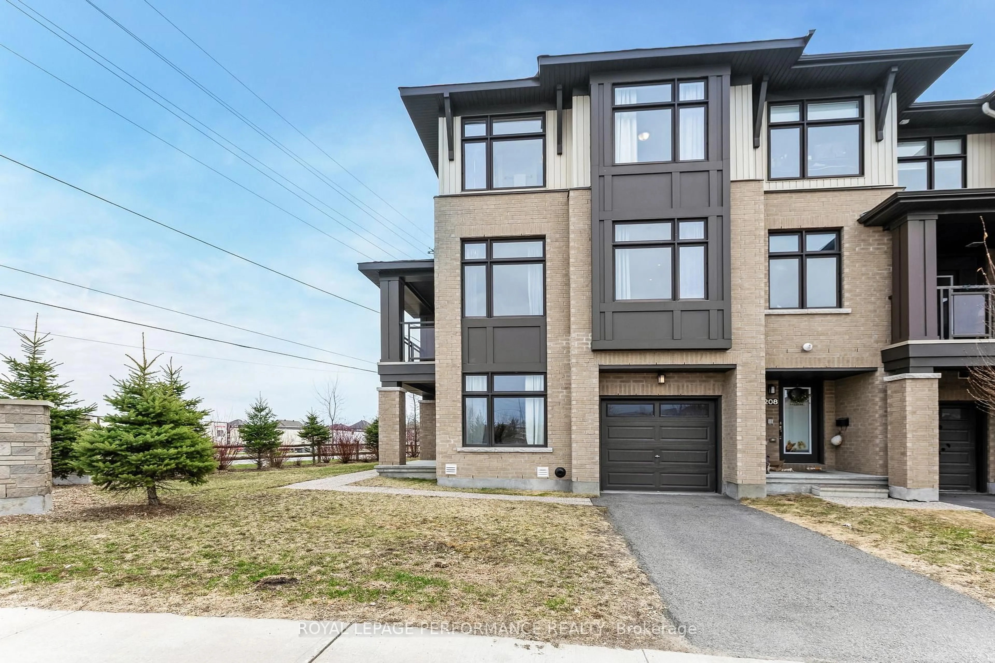 Home with brick exterior material, street for 210 Poplin St, Ottawa Ontario K4M 0E2