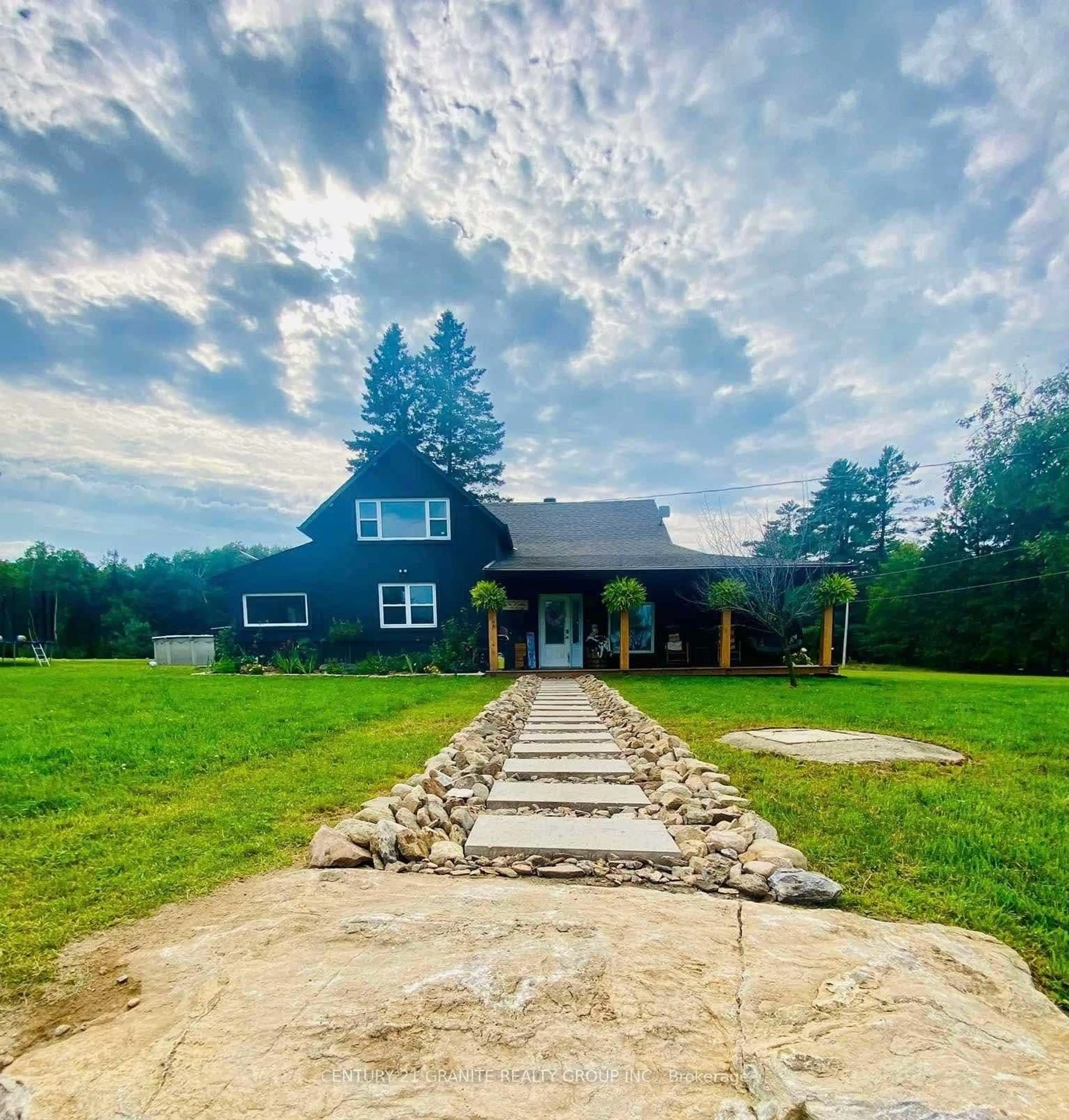A pic from outside/outdoor area/front of a property/back of a property/a pic from drone, mountain view for 1221 Bay Lake Rd, Bancroft Ontario K0L 1C0
