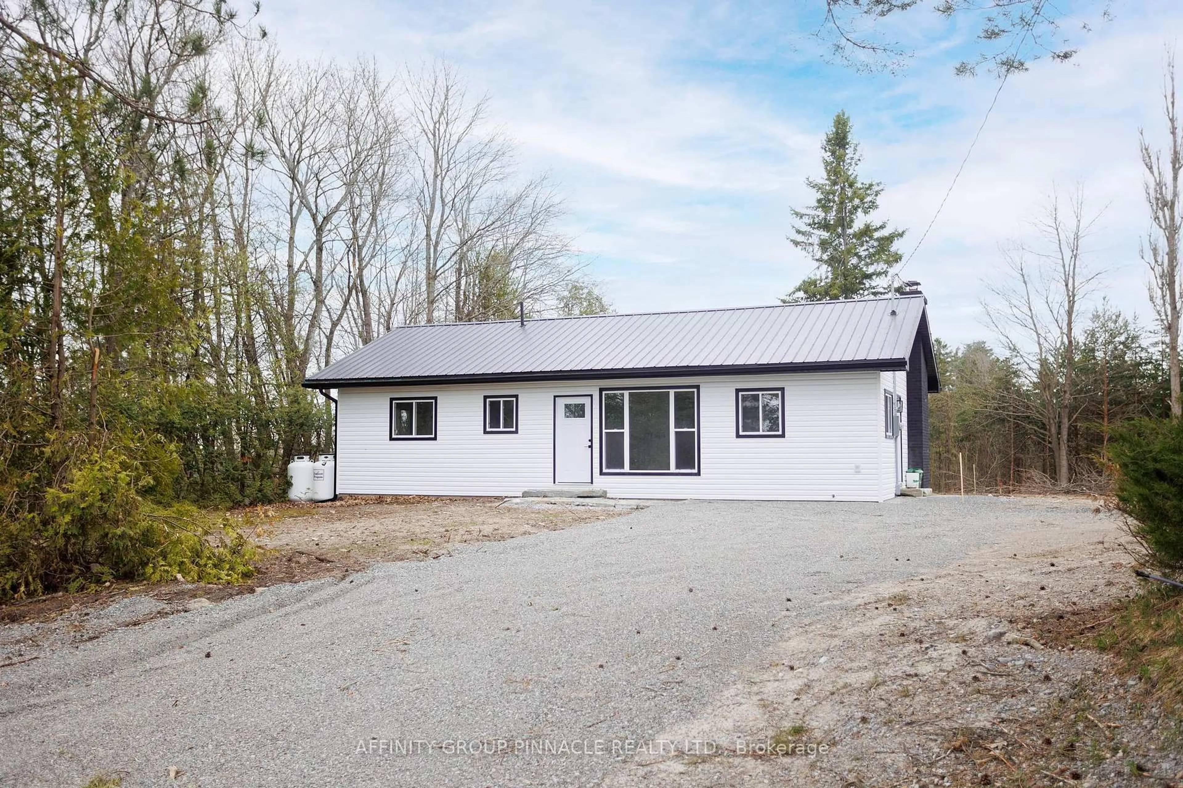 A pic from outside/outdoor area/front of a property/back of a property/a pic from drone, building for 100 Reid St, Kawartha Lakes Ontario K0M 1A0