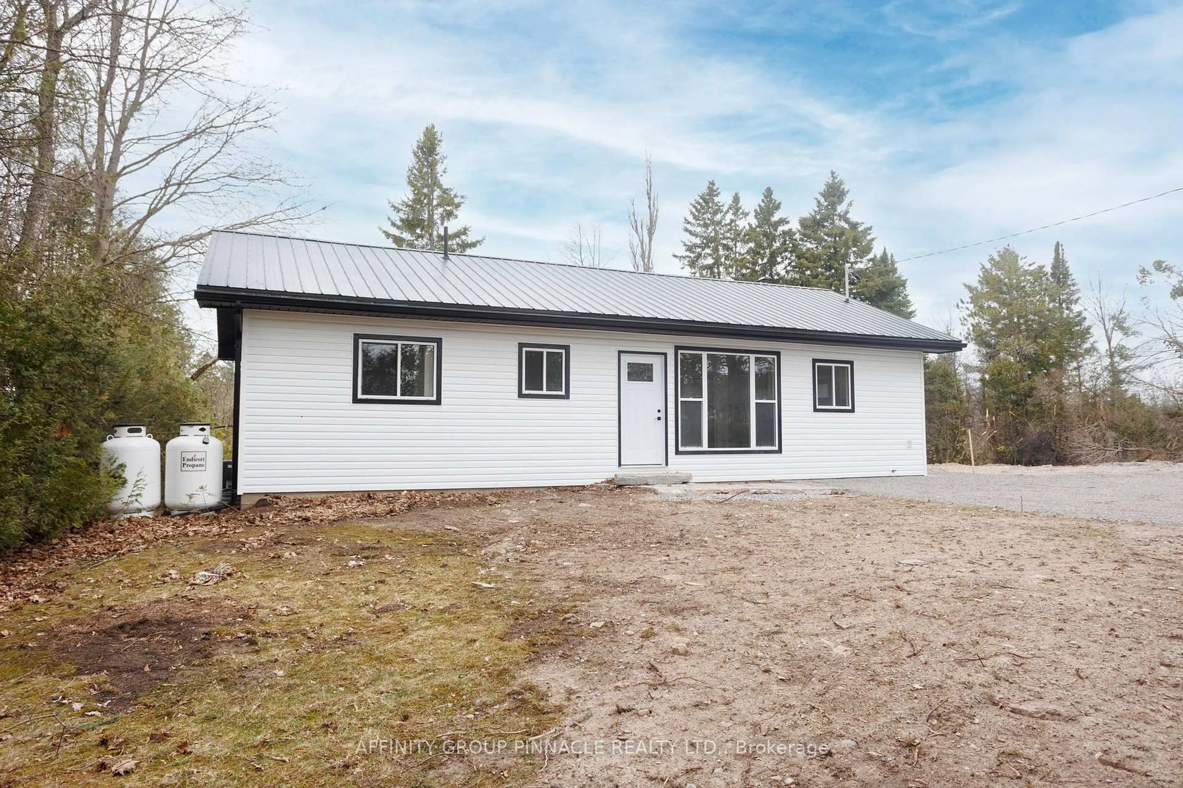 Home with vinyl exterior material, building for 100 Reid St, Kawartha Lakes Ontario K0M 1A0