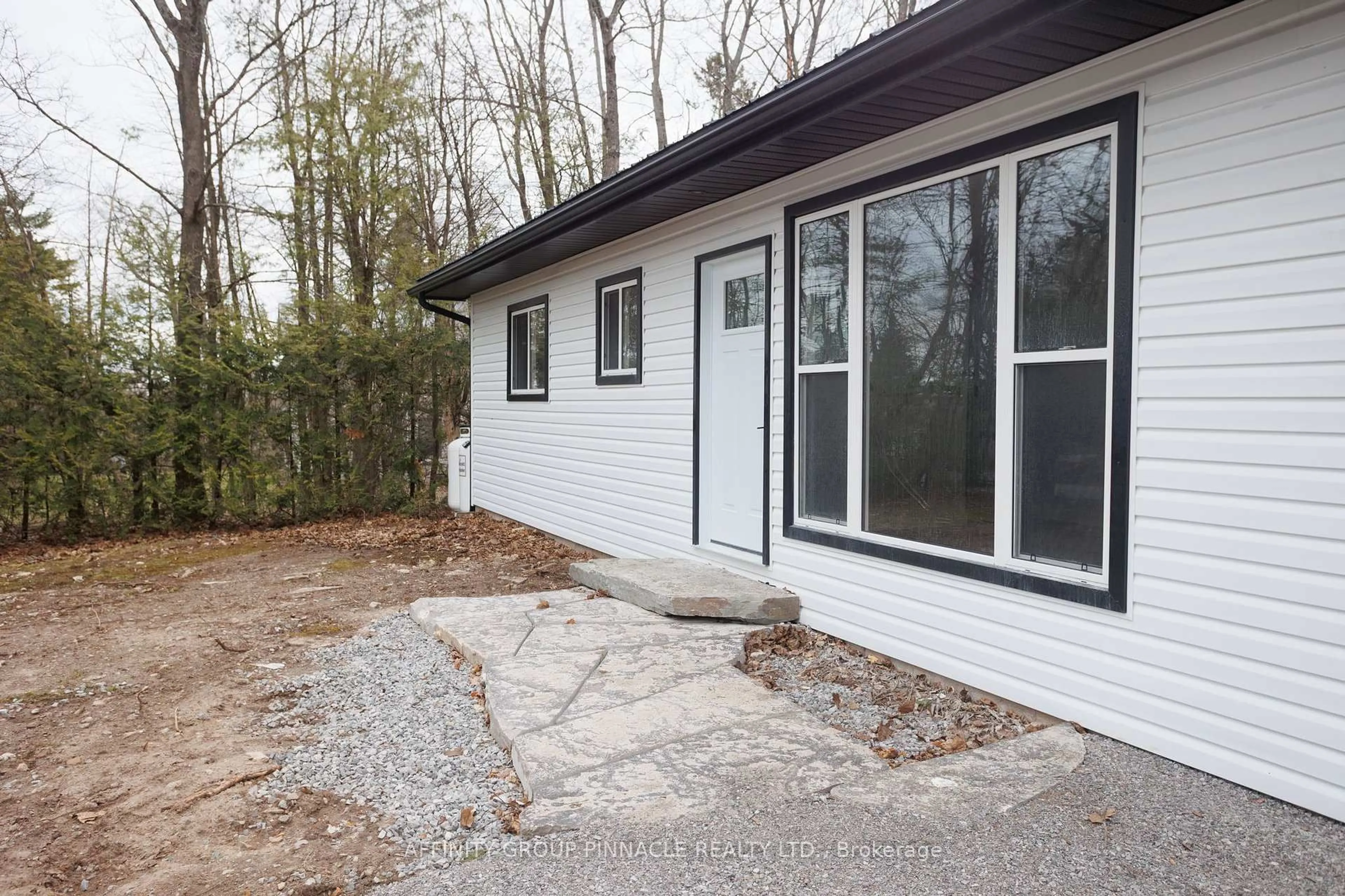 Home with vinyl exterior material, unknown for 100 Reid St, Kawartha Lakes Ontario K0M 1A0