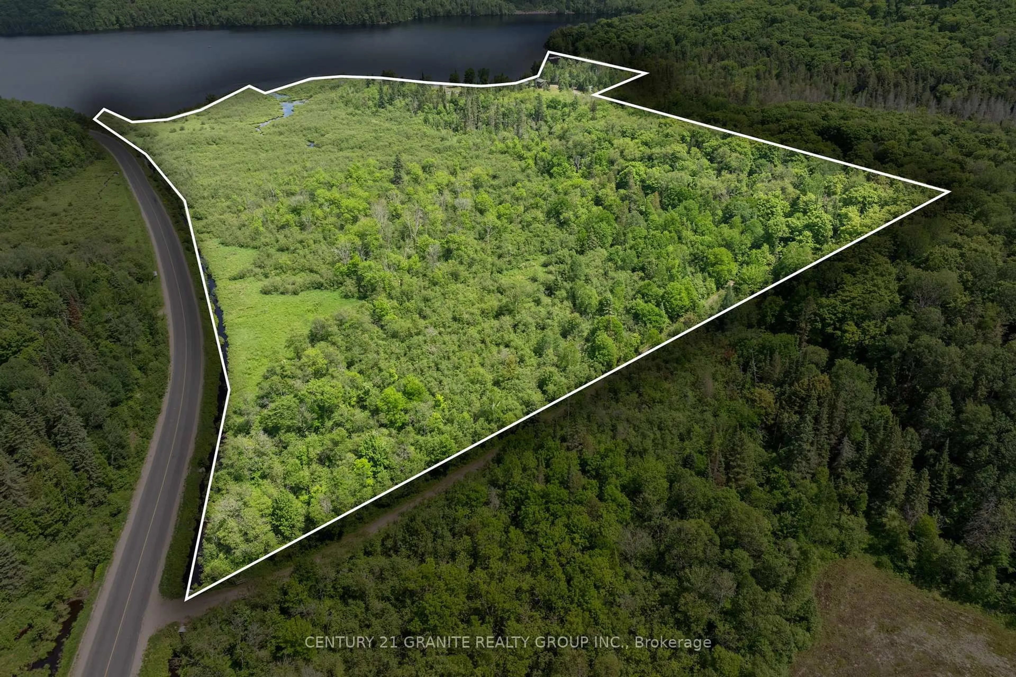 A pic from outside/outdoor area/front of a property/back of a property/a pic from drone, unknown for 3493 South Baptiste Lake Rd, Highlands East Ontario K0L 2A0