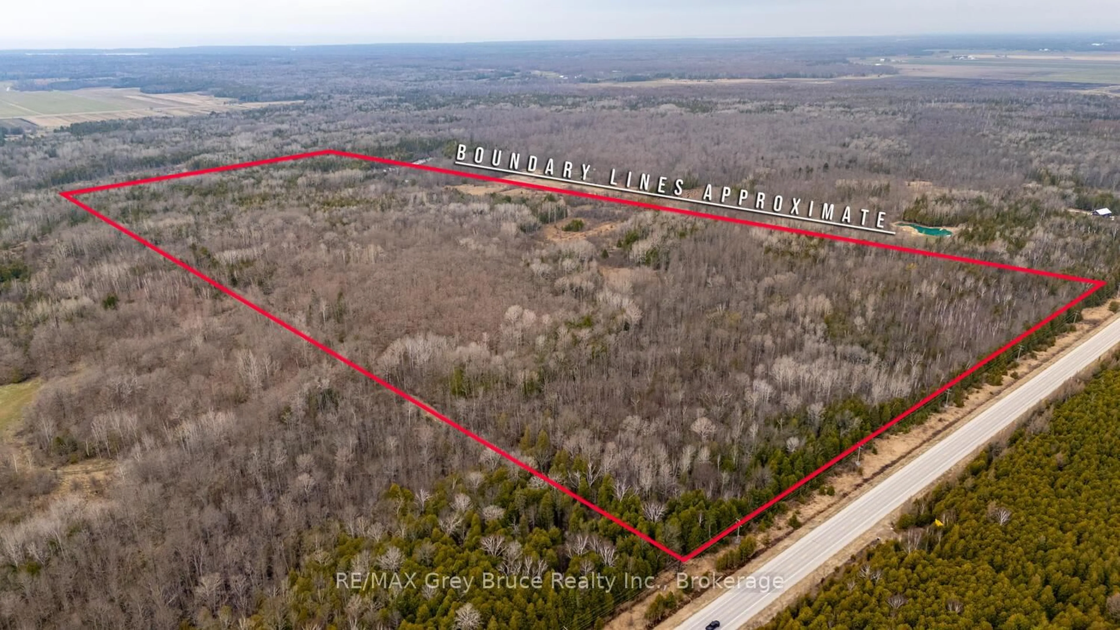 A pic from outside/outdoor area/front of a property/back of a property/a pic from drone, forest/trees view for 65 Lawrence Rd, South Bruce Peninsula Ontario N0H 2T0