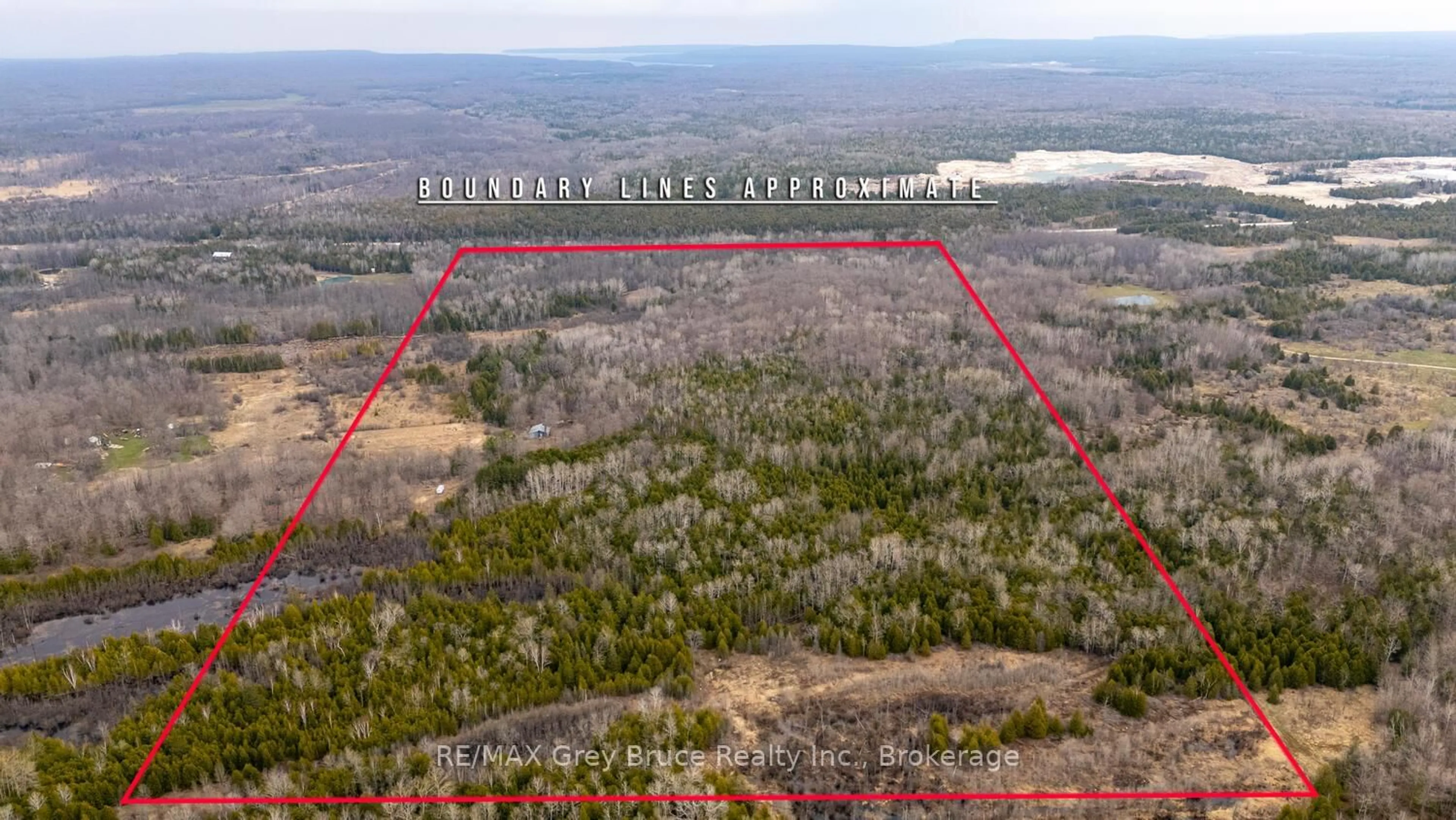 A pic from outside/outdoor area/front of a property/back of a property/a pic from drone, forest/trees view for 65 Lawrence Rd, South Bruce Peninsula Ontario N0H 2T0
