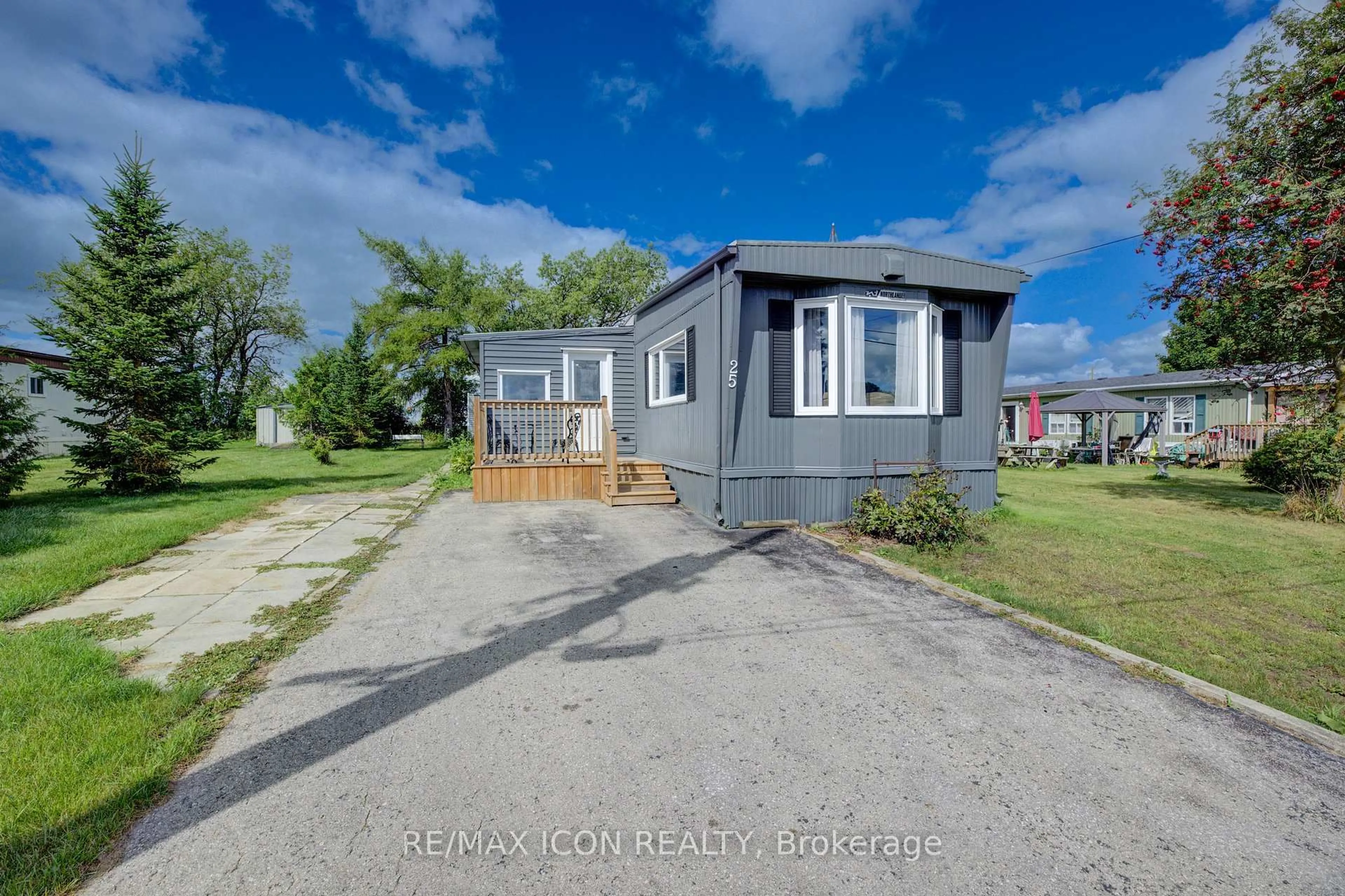 A pic from outside/outdoor area/front of a property/back of a property/a pic from drone, street for 25 Grand Vista Cres, Wellington North Ontario N0G 2L0
