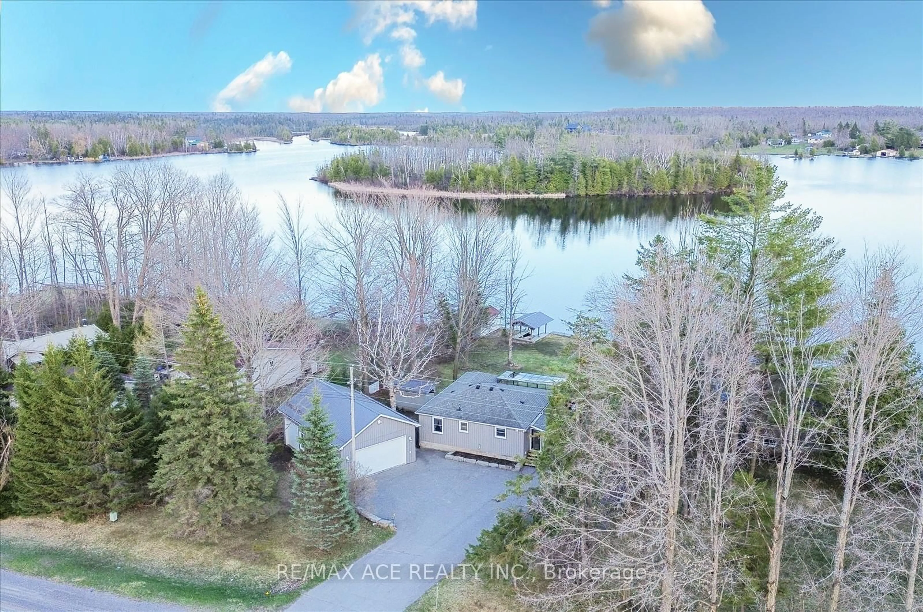 A pic from outside/outdoor area/front of a property/back of a property/a pic from drone, water/lake/river/ocean view for 1308 Portage Rd, Kawartha Lakes Ontario K0M 2B0