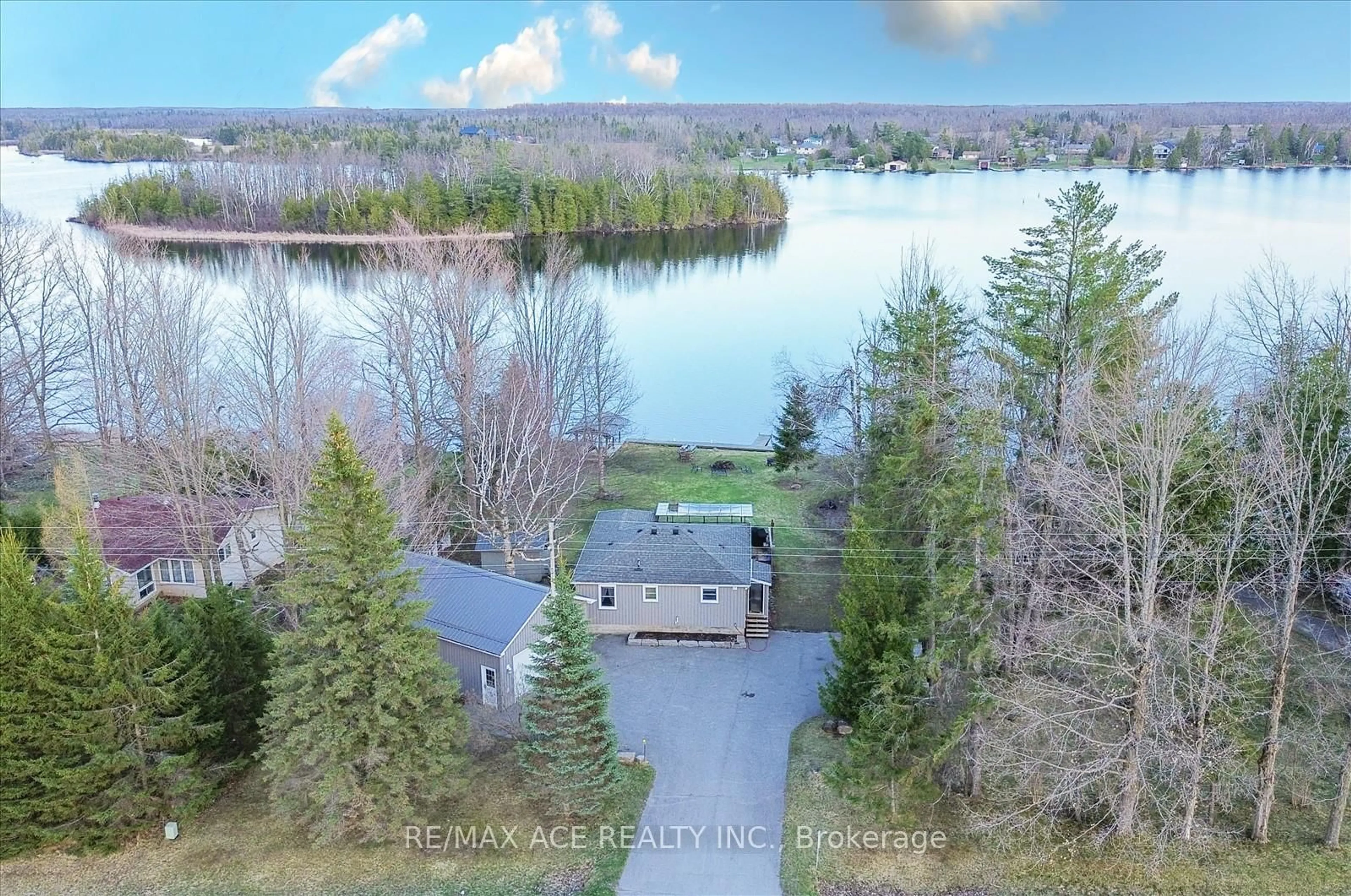 A pic from outside/outdoor area/front of a property/back of a property/a pic from drone, water/lake/river/ocean view for 1308 Portage Rd, Kawartha Lakes Ontario K0M 2B0