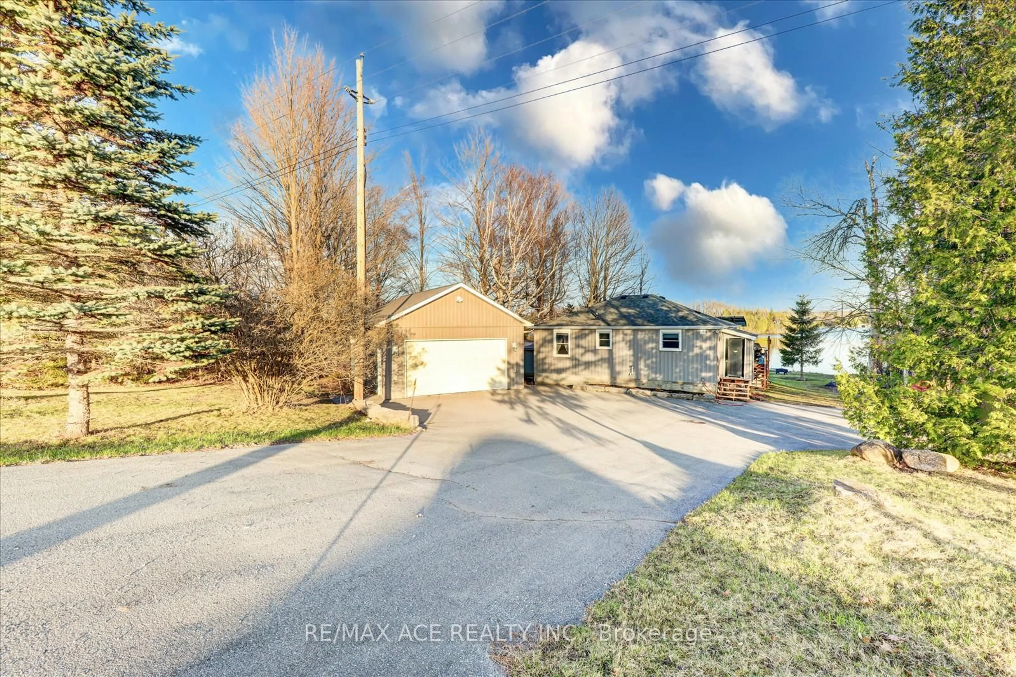 A pic from outside/outdoor area/front of a property/back of a property/a pic from drone, street for 1308 Portage Rd, Kawartha Lakes Ontario K0M 2B0