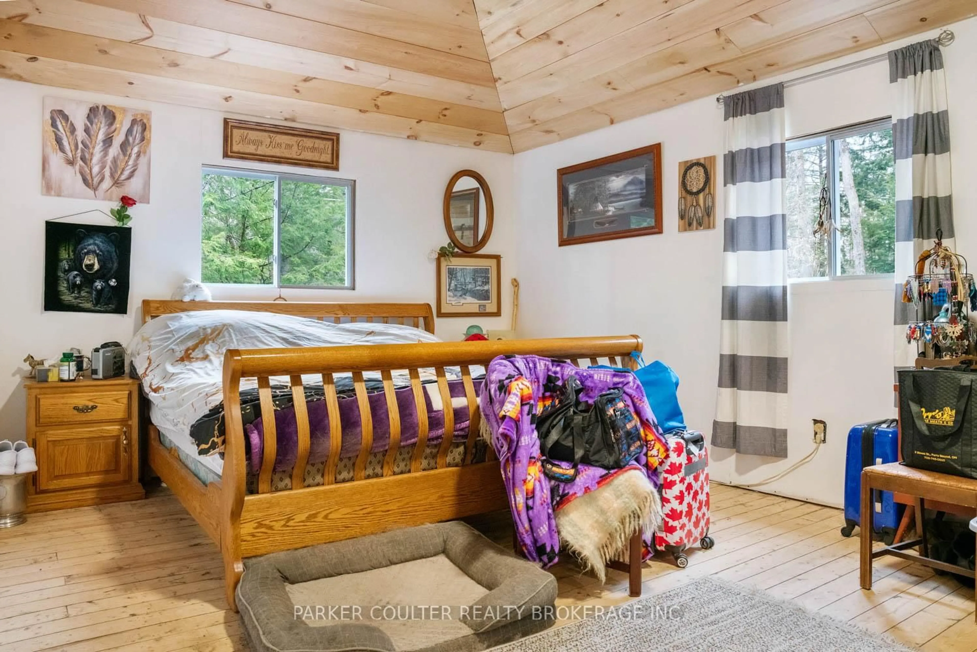 Bedroom with bed, wood/laminate floor for 34A Broad River Rd, Seguin Ontario P2A 2W8