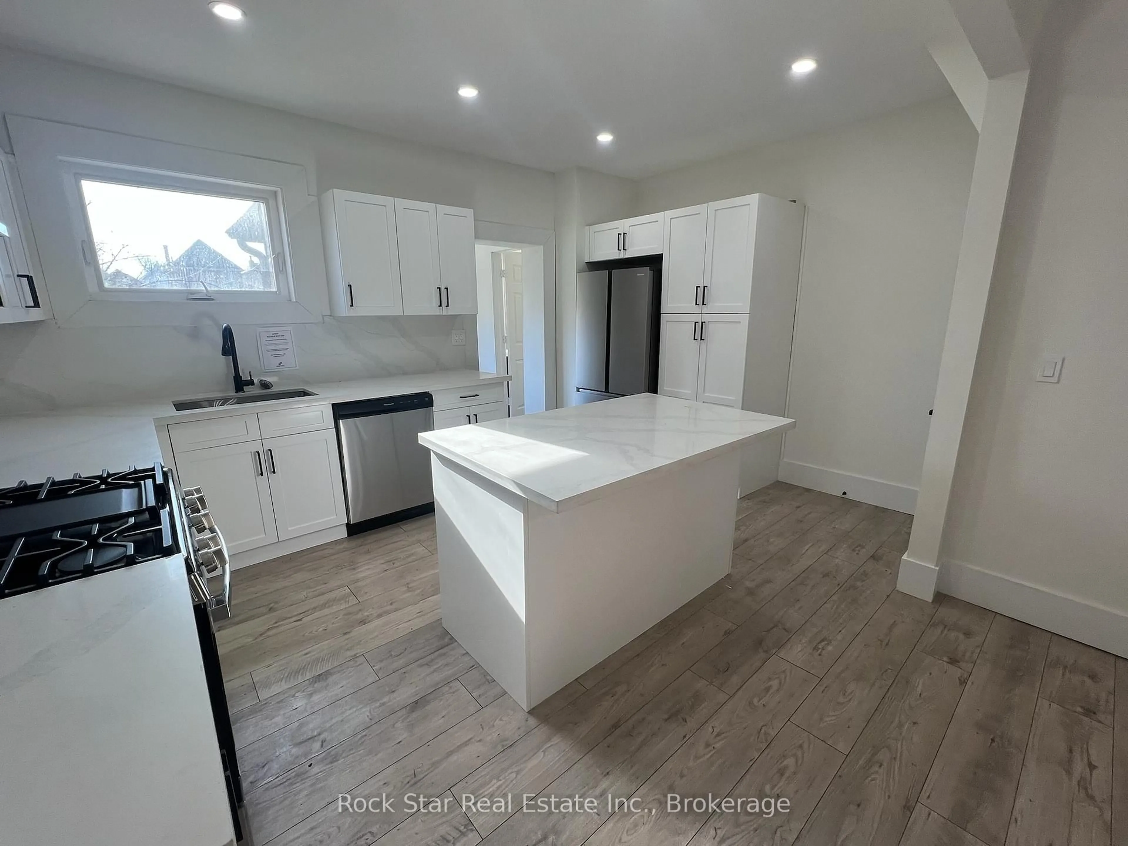 Open concept kitchen, unknown for 14 Ruth St, Hamilton Ontario L8L 6P9