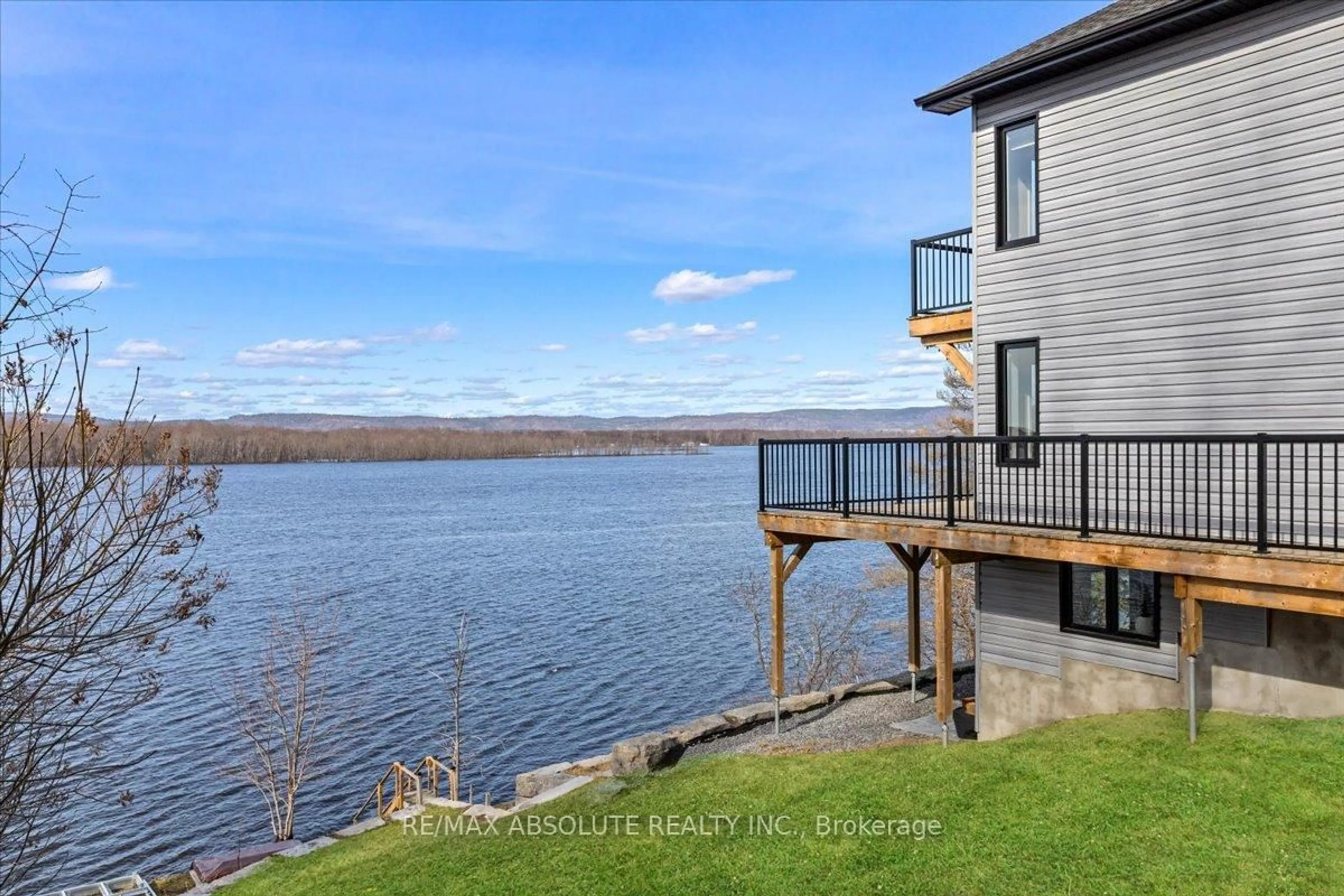 A pic from outside/outdoor area/front of a property/back of a property/a pic from drone, water/lake/river/ocean view for 304 Riverwood Dr, Ottawa Ontario K0A 3M0