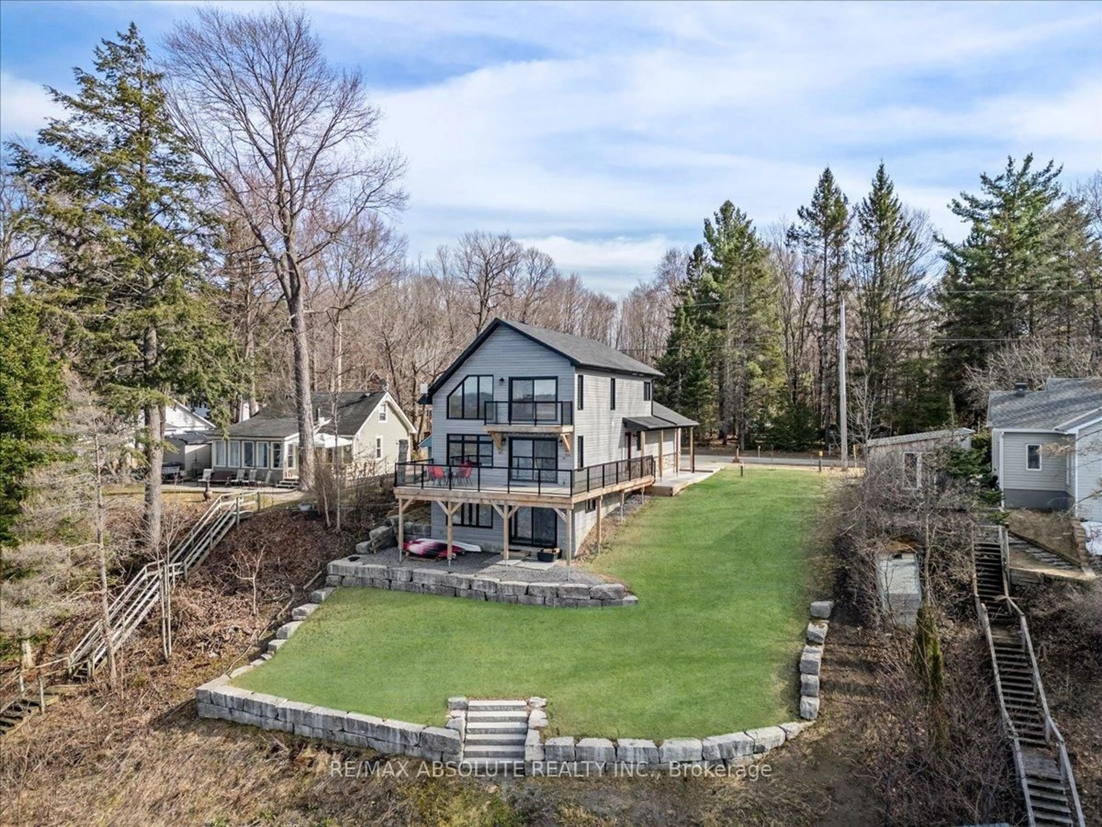 A pic from outside/outdoor area/front of a property/back of a property/a pic from drone, water/lake/river/ocean view for 304 Riverwood Dr, Ottawa Ontario K0A 3M0
