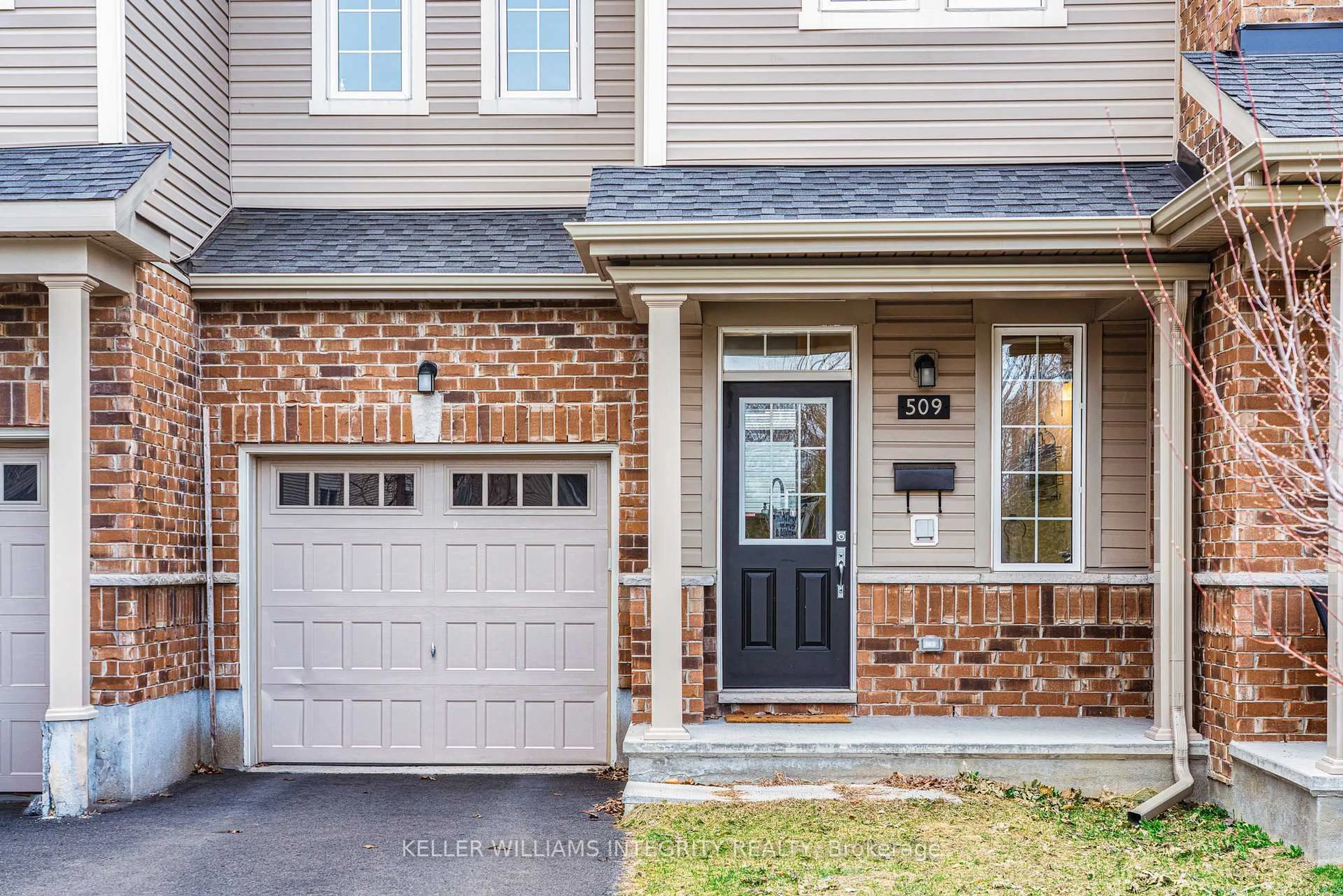Home with brick exterior material, street for 509 Tulip Tree Way, Ottawa Ontario K1W 0L8