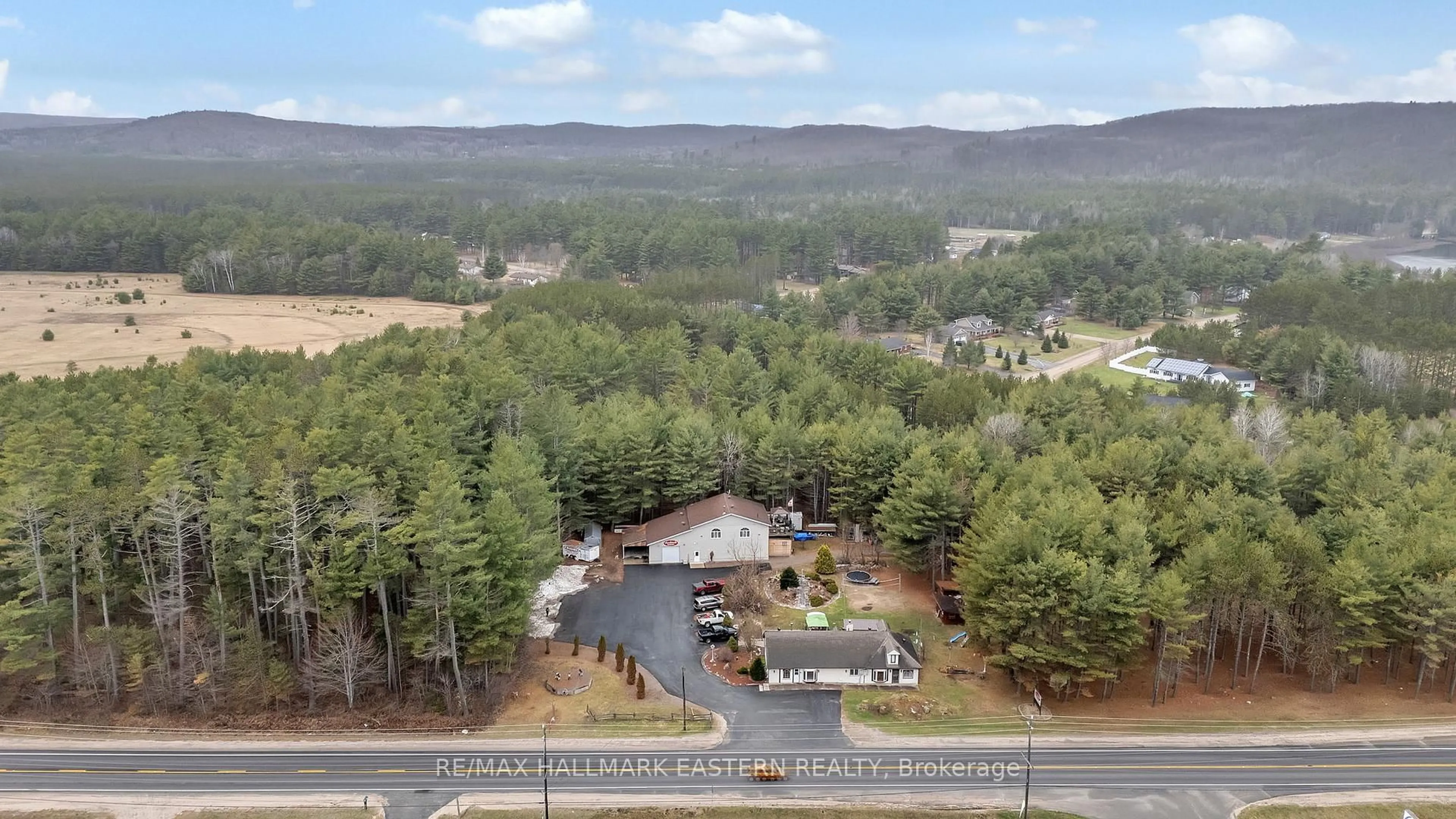 A pic from outside/outdoor area/front of a property/back of a property/a pic from drone, mountain view for 29715 Highway 62 N N/A, Bancroft Ontario K0L 1C0