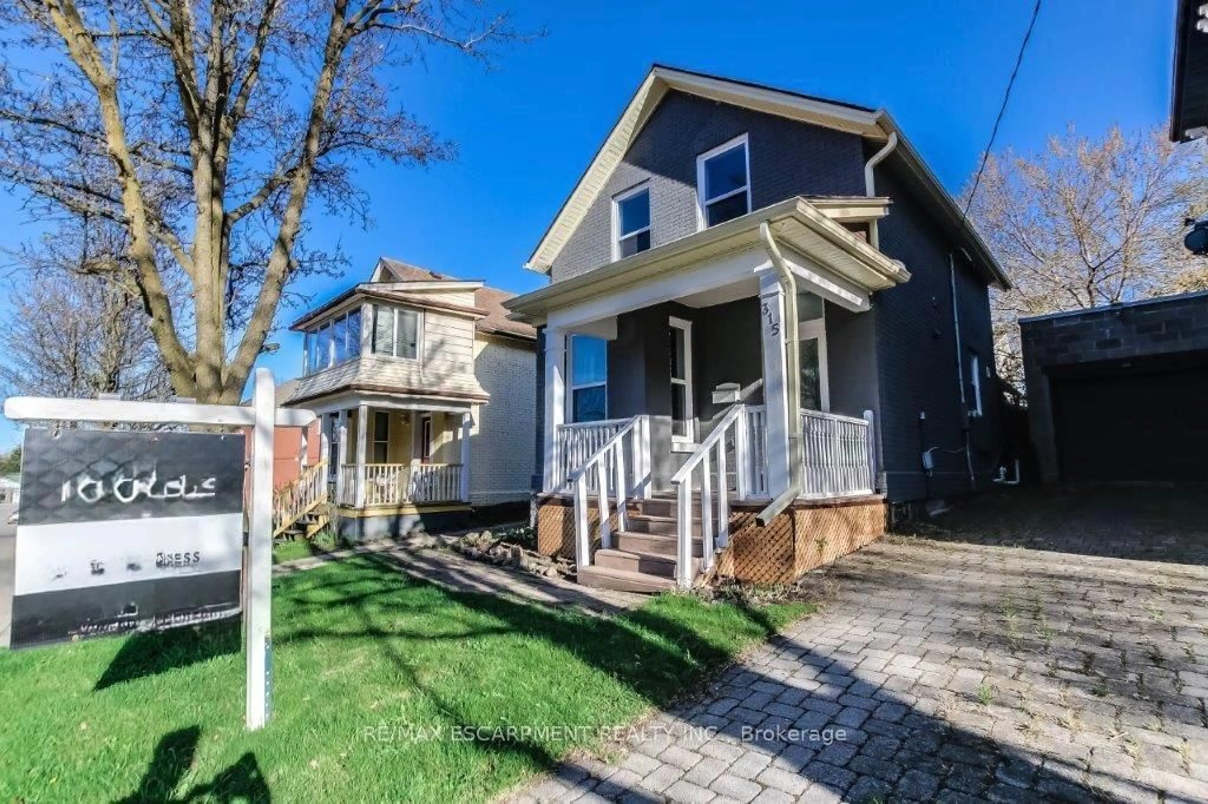 Home with brick exterior material, street for 315 SIMCOE St, Woodstock Ontario N4S 1J2