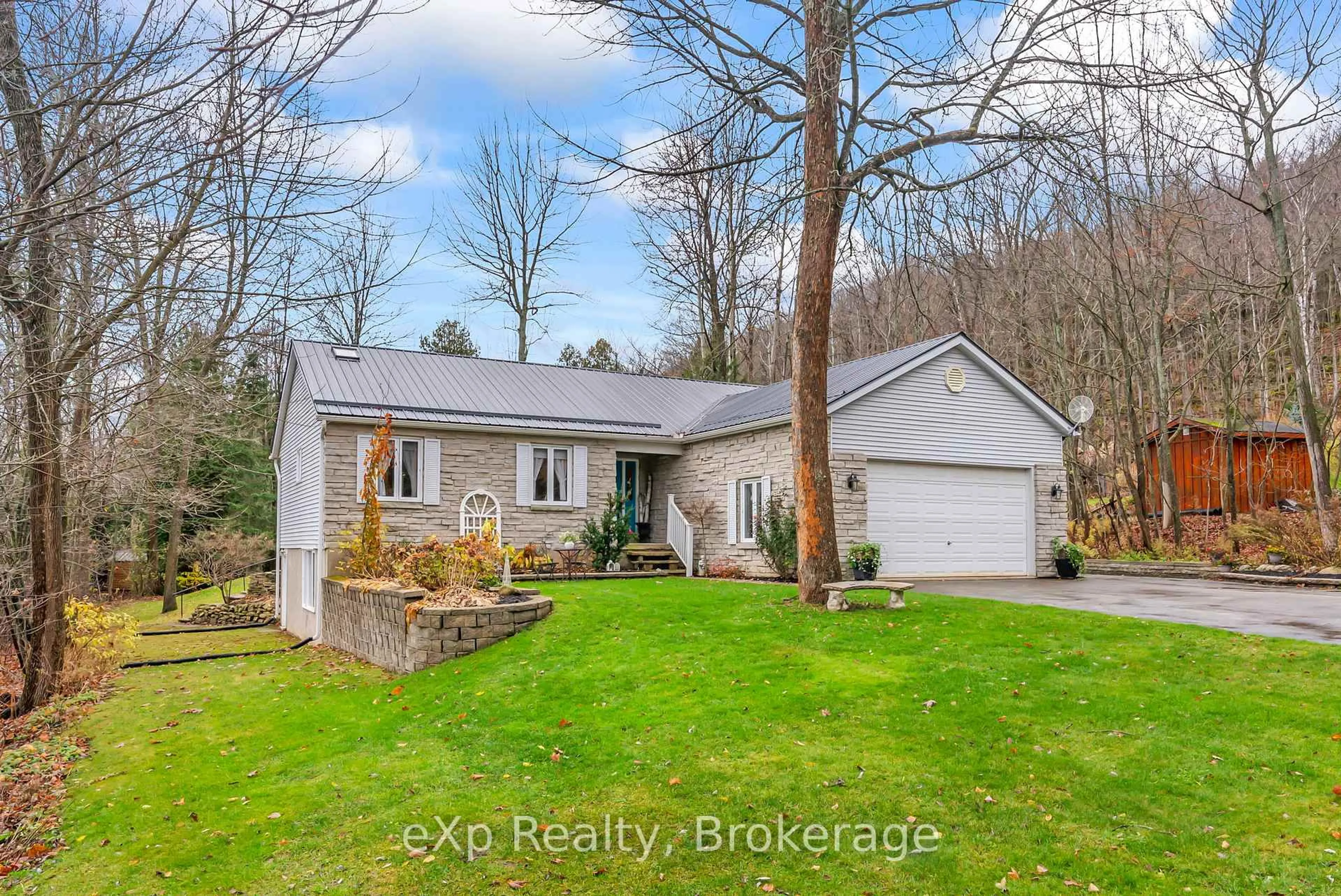 A pic from outside/outdoor area/front of a property/back of a property/a pic from drone, water/lake/river/ocean view for 5 15TH Ave, South Bruce Peninsula Ontario N0H 2T0